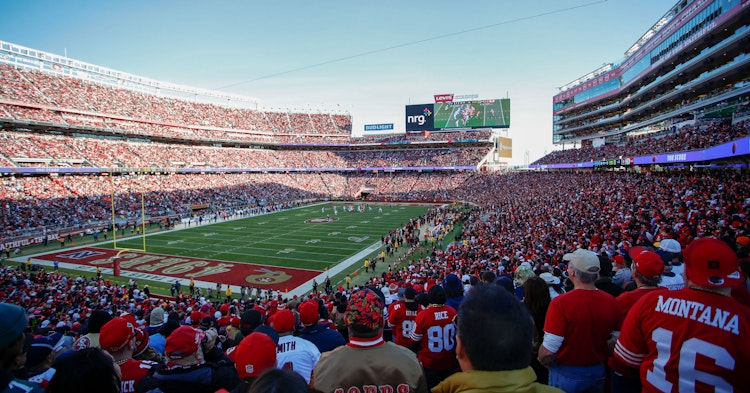Fans at Levi's Stadium watch an NFL game.