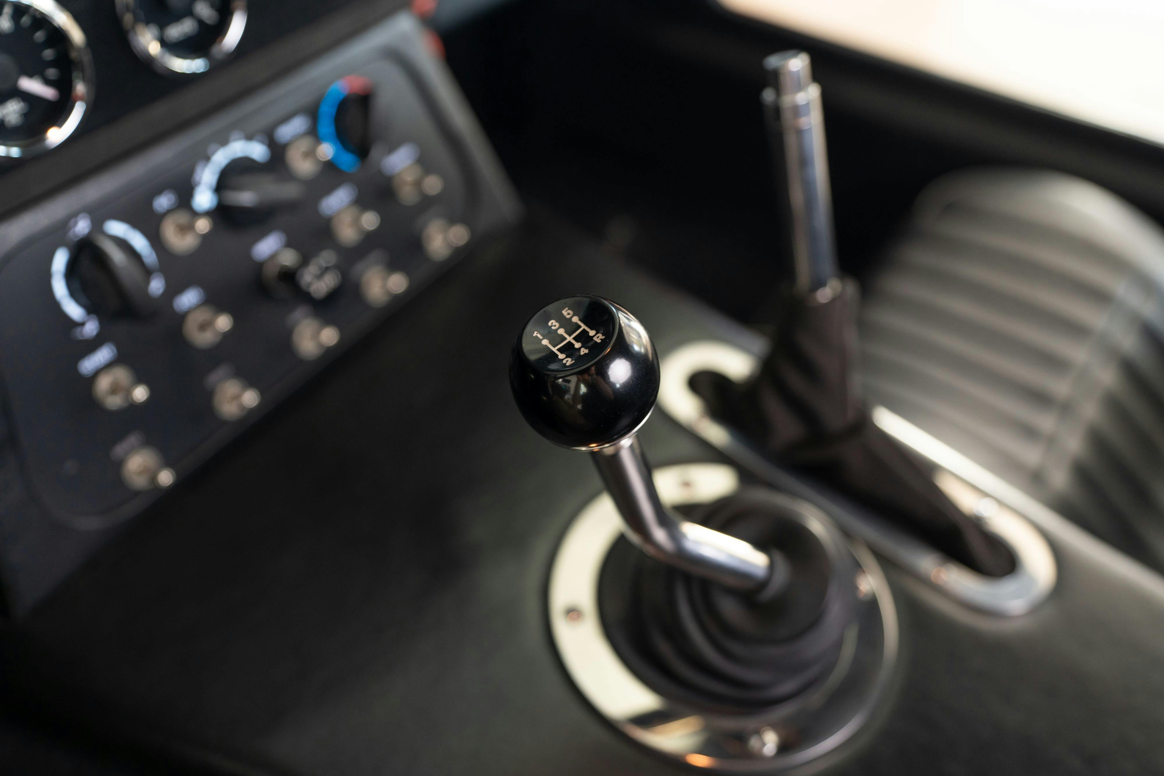 Interior of a 1965 Superformance Shelby Daytona CSX9000 in Monza Red.