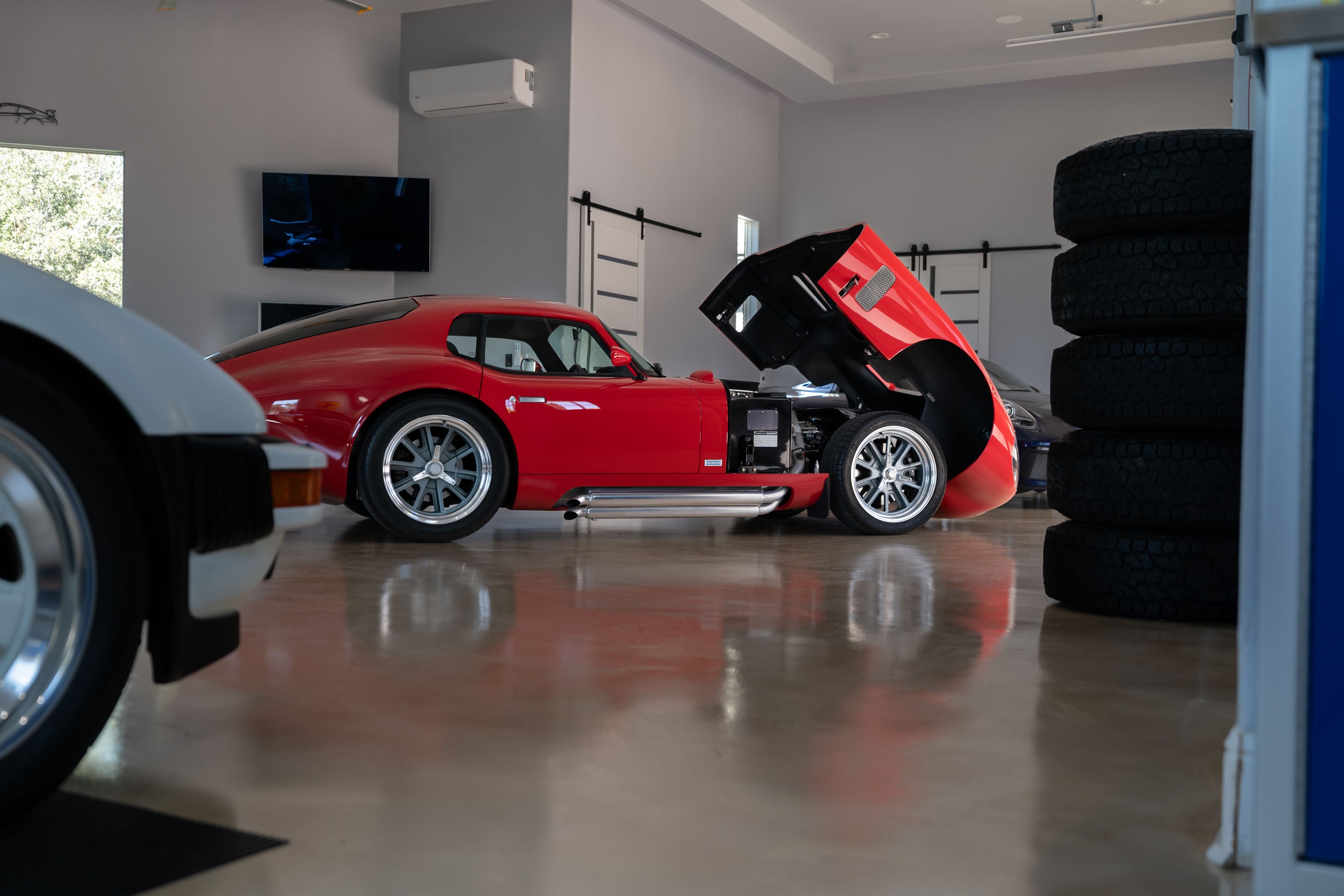 1965 Superformance Shelby Daytona CSX9114 in Monza Red.