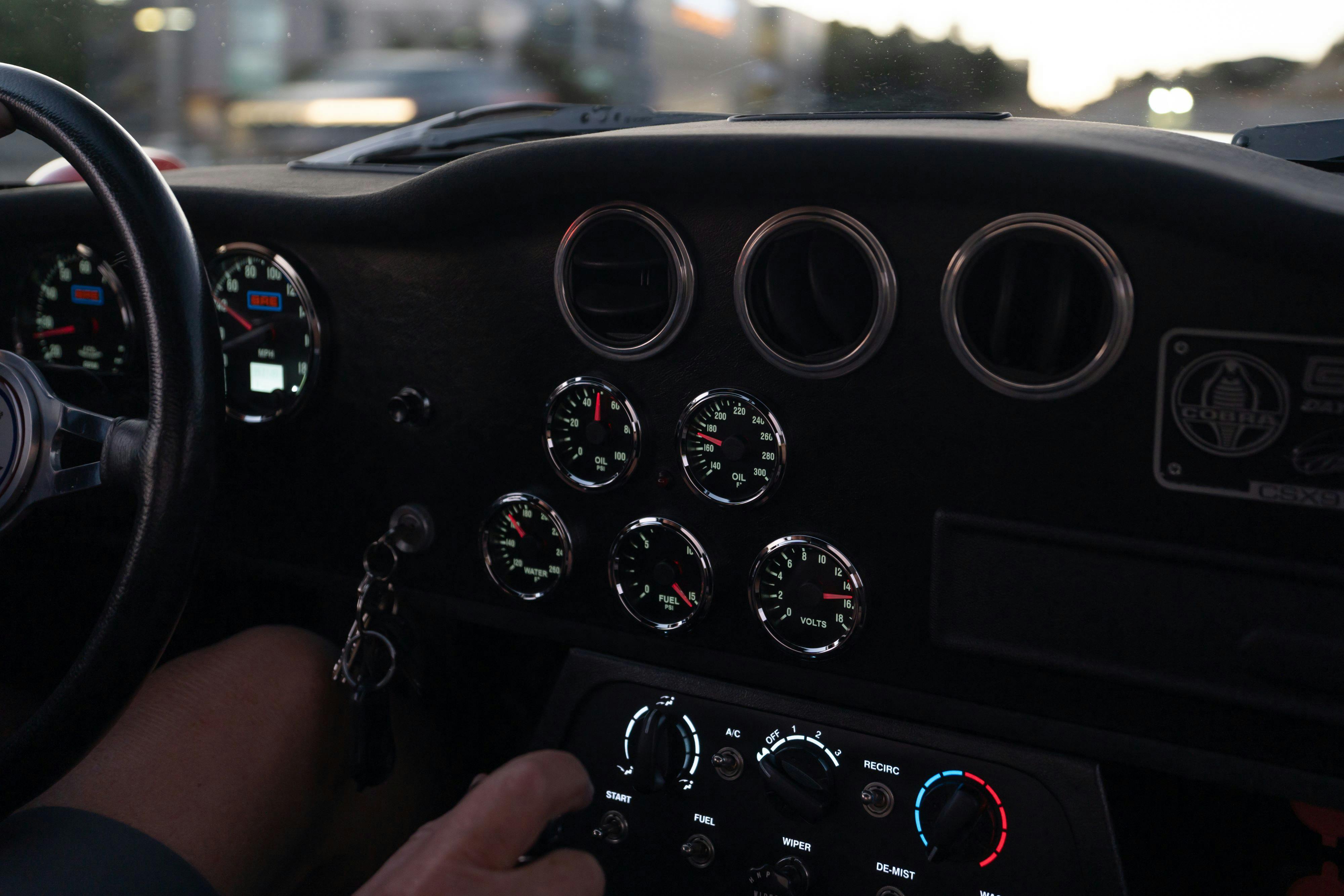 Driving a 1965 Superformance Shelby Daytona CSX9000 in Monza Red.