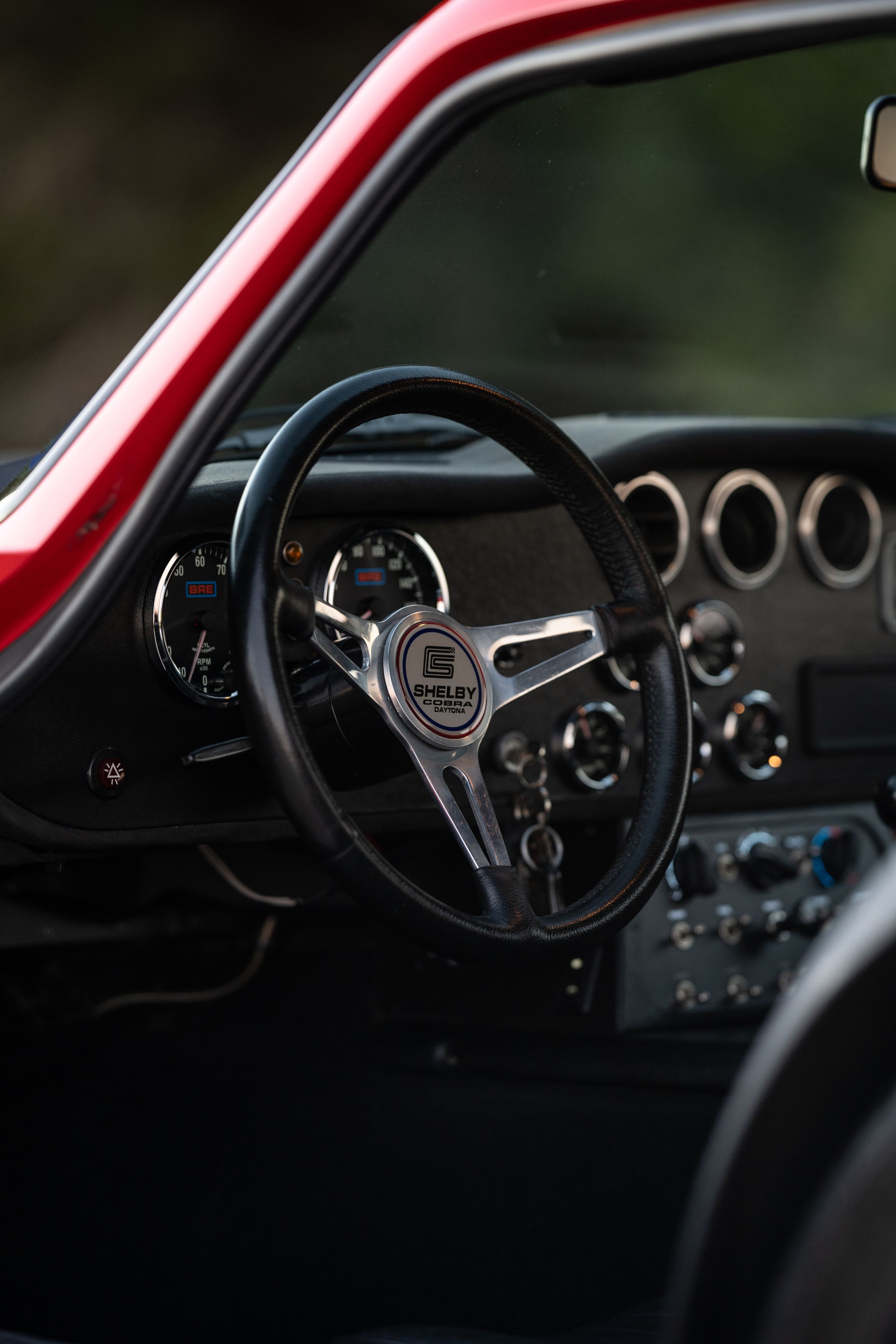 1965 Superformance Shelby Daytona CSX9114 steering wheel in Monza Red.