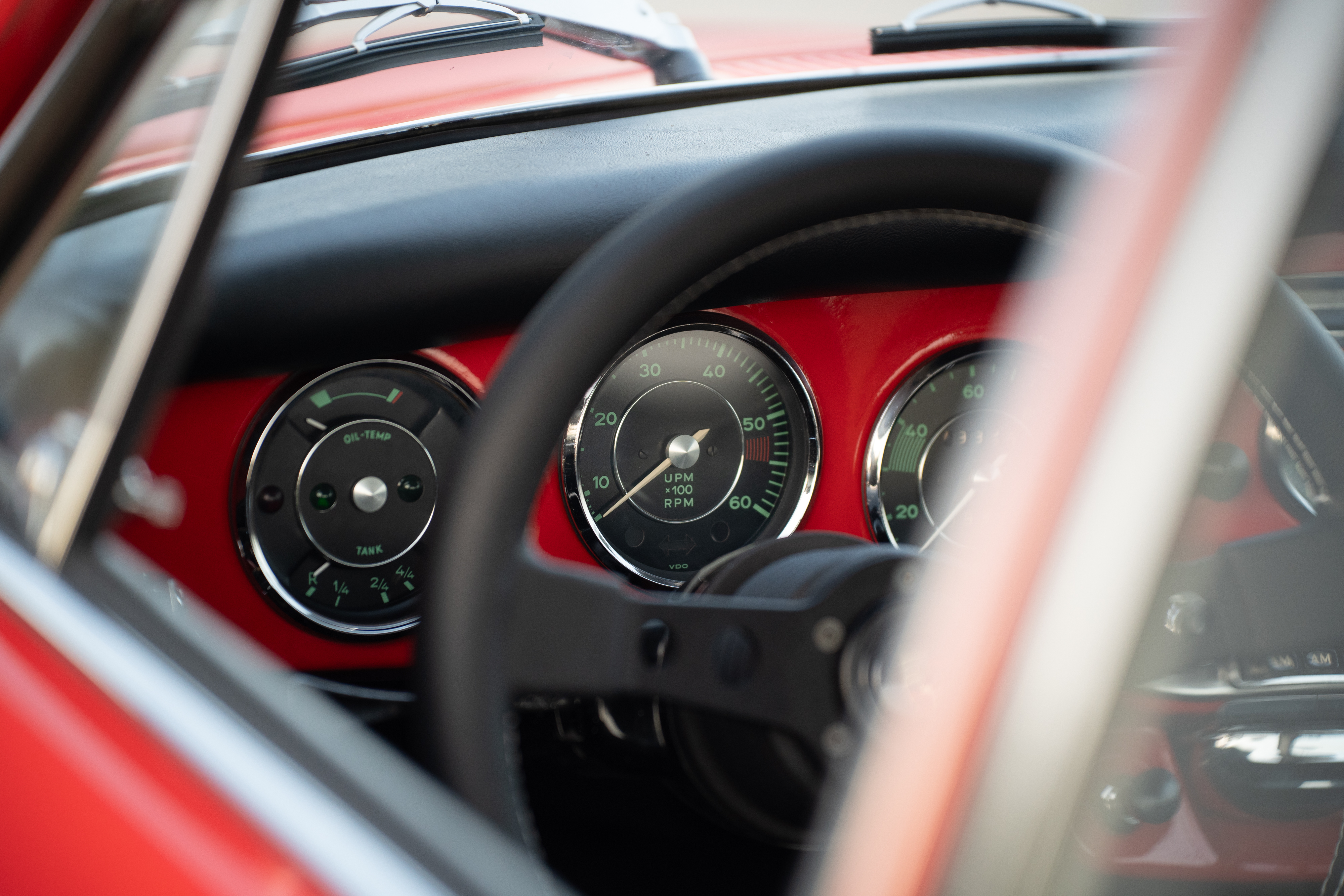 Gauges on a Red on Black 1965 Porsche 356C Coupe shot in Austin, TX.