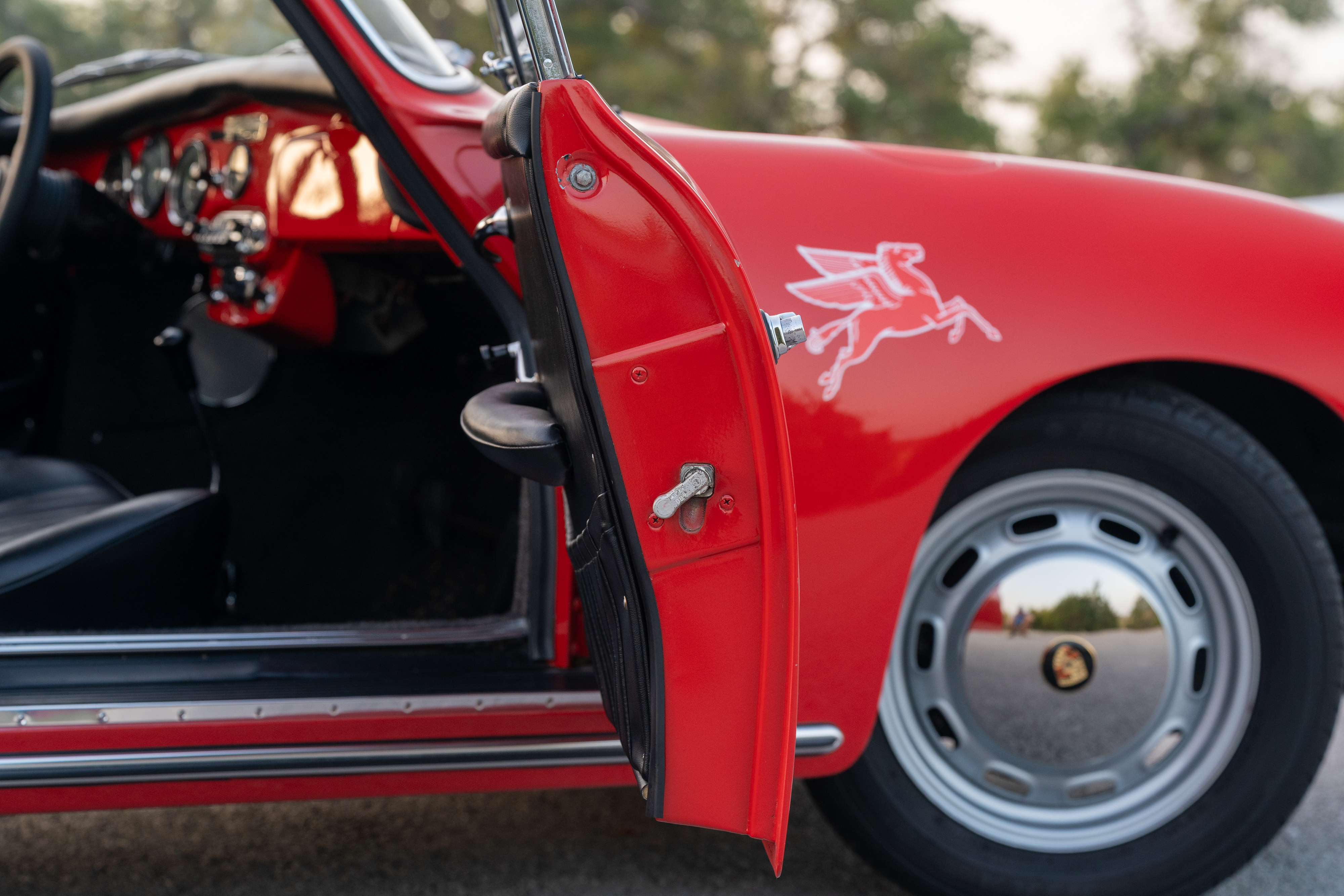 Passenger door on a Red on Black 1965 Porsche 356C Coupe shot in Austin, TX.