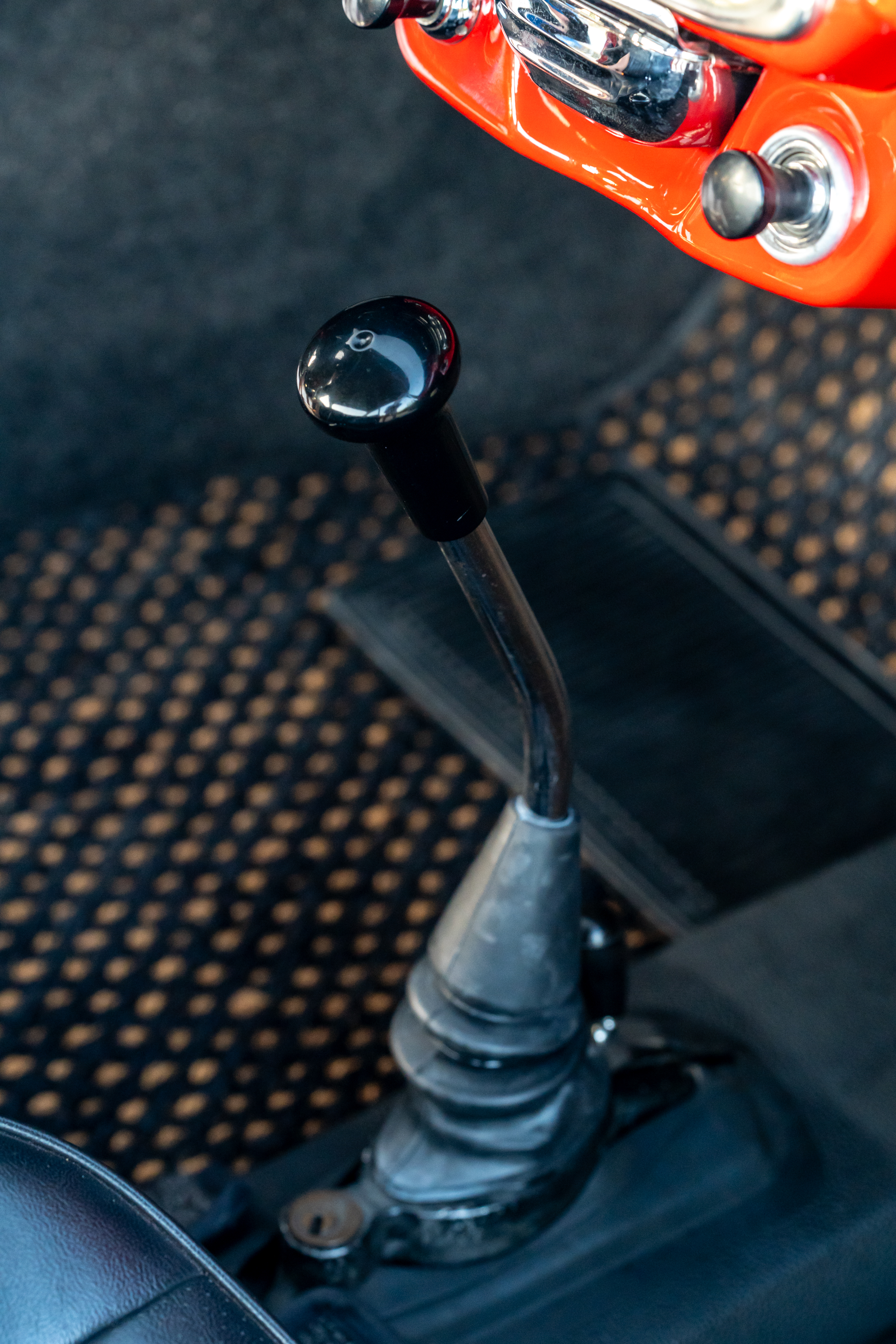 Shifter for a Red on Black 1965 Porsche 356C Coupe shot in Austin, TX.