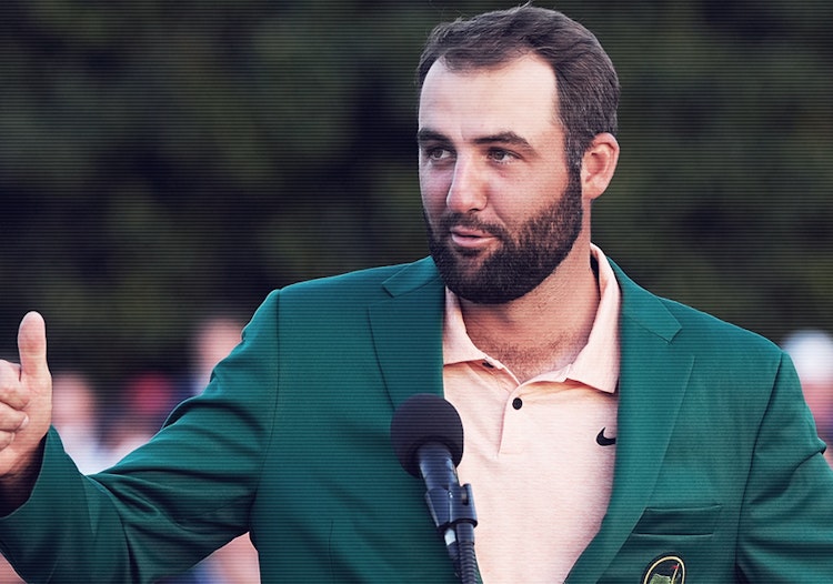 Scottie Scheffler celebrates in the green jacket after winning the 2024 Masters at Augusta National.