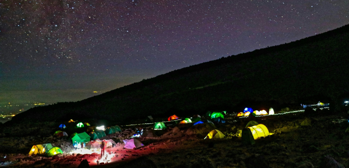 Illuminated-campsite-on-Kilimanjaro-at-night---The-Adventure-People.png