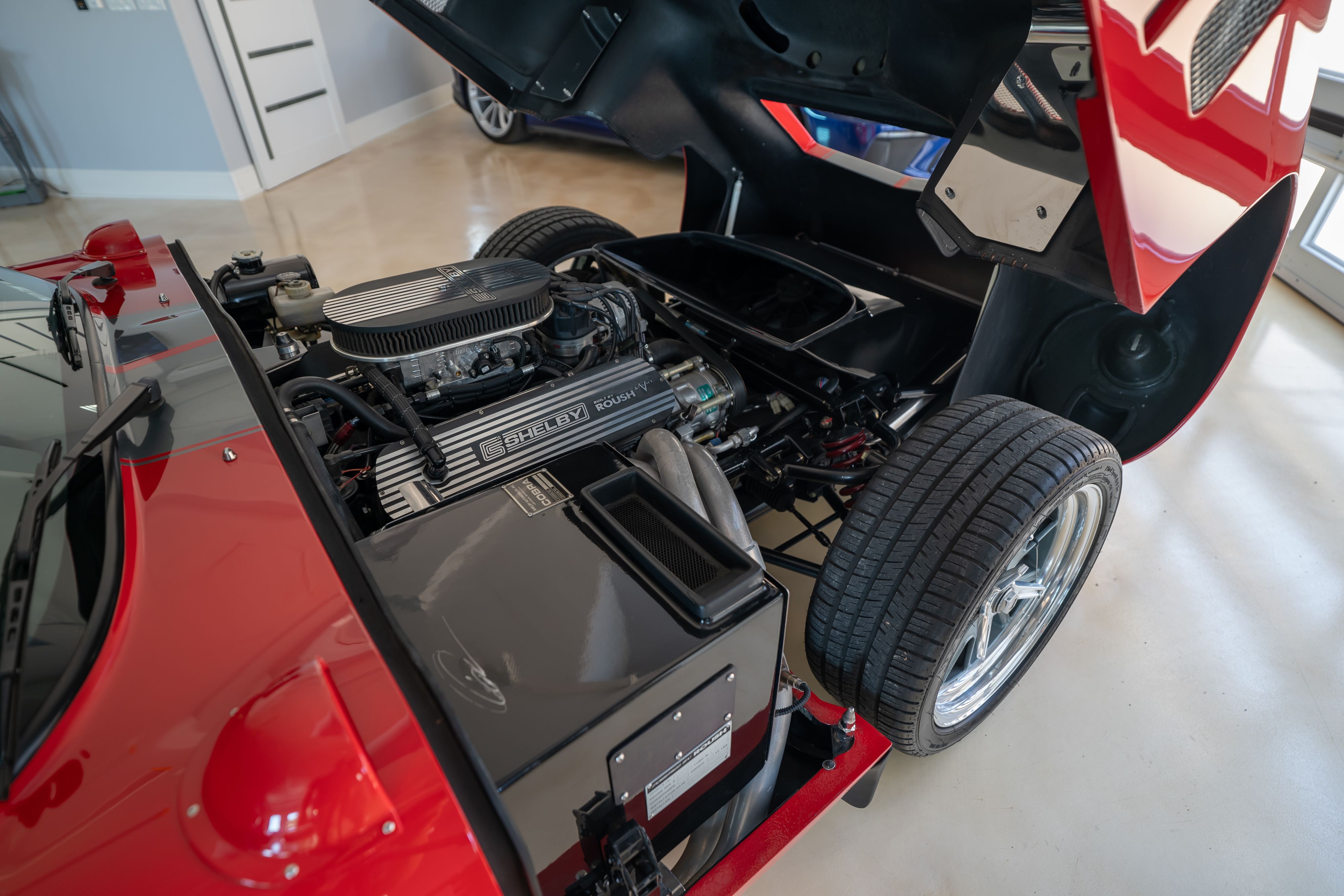 Roush 427 in a 1965 Superformance Shelby Daytona CSX9000 in Monza Red.