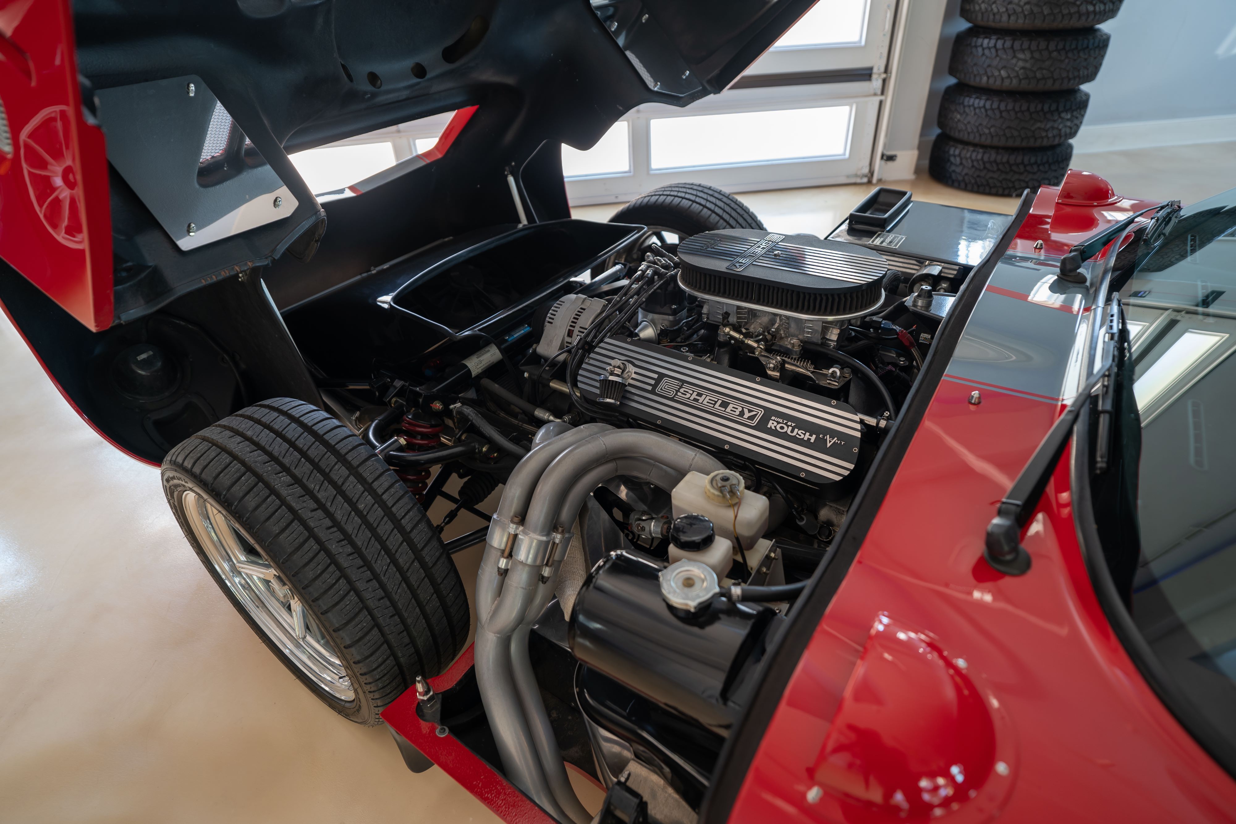 Roush 427 in a 1965 Superformance Shelby Daytona CSX9000 in Monza Red.