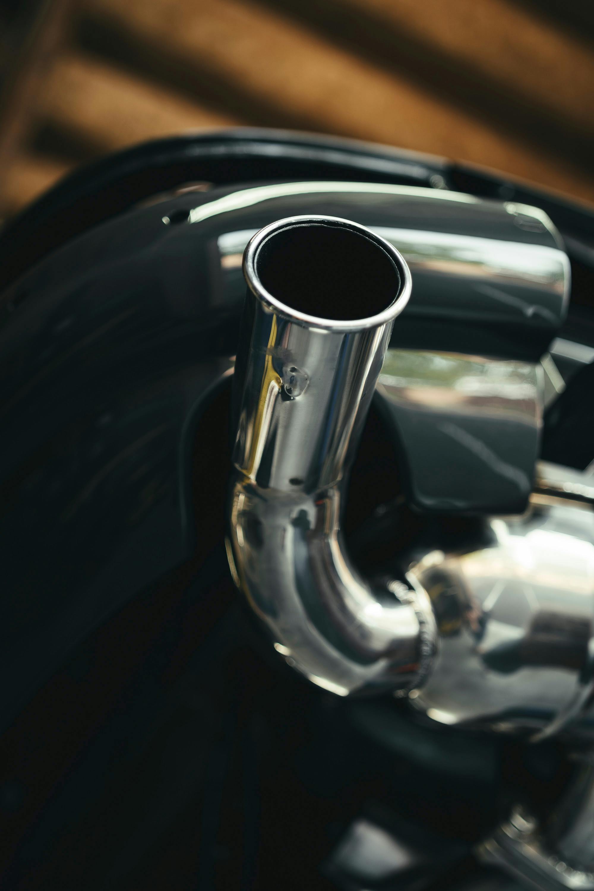 Polished exhaust on a fully restored 911 at CPR.