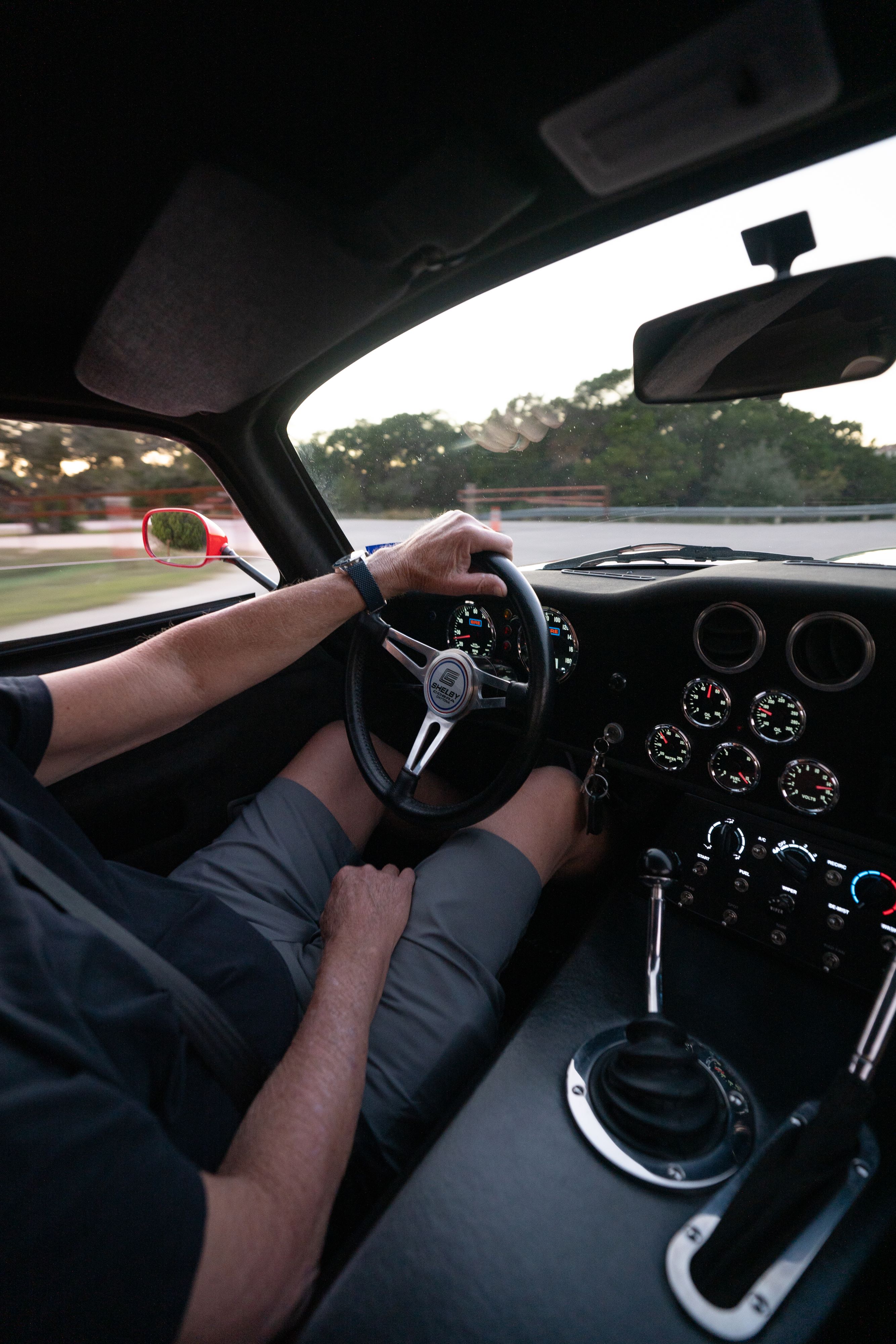 Driving a 1965 Superformance Shelby Daytona CSX9000 in Monza Red.