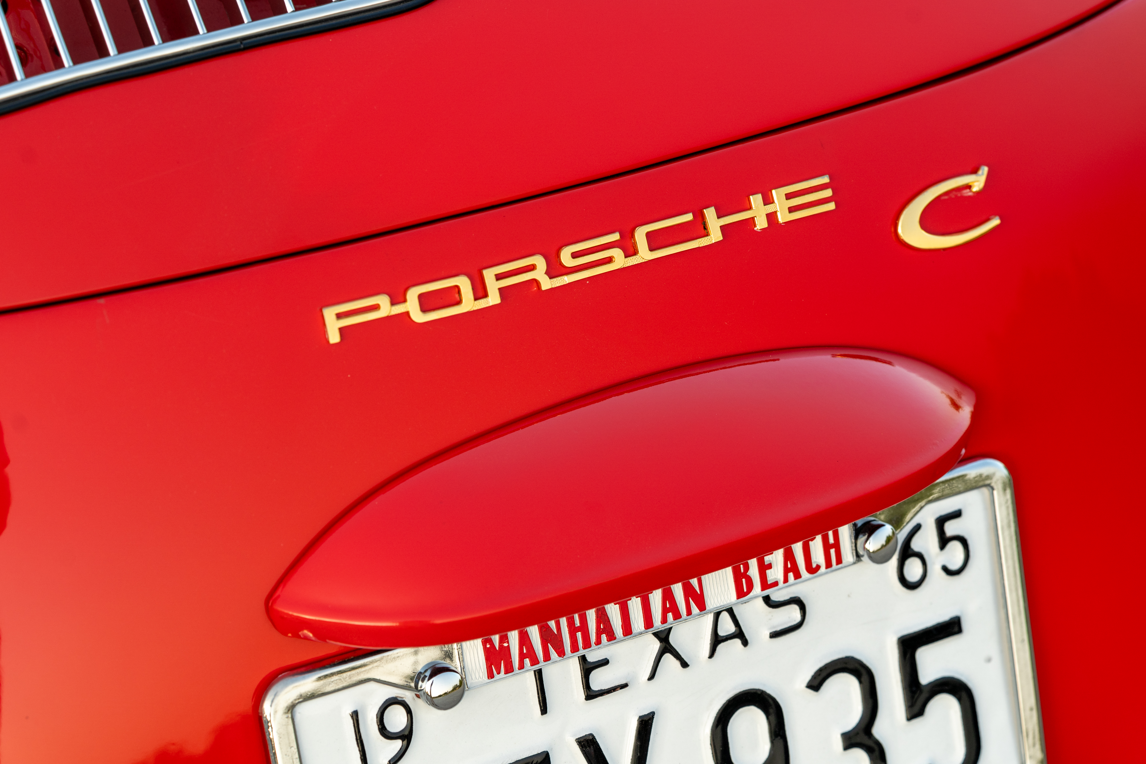 Badging of a 1965 Porsche 356C Coupe shot in Austin, TX.