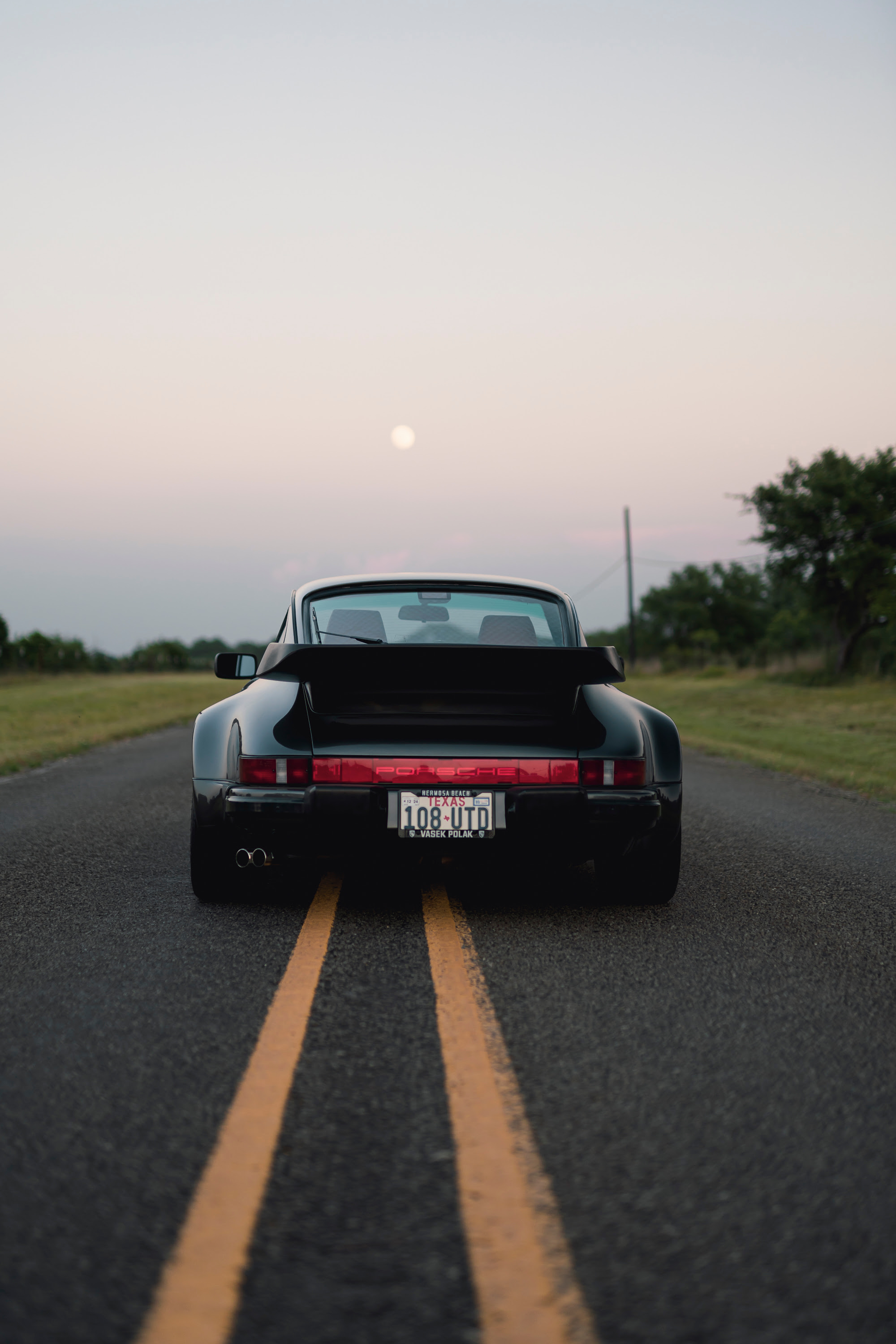 930 Turbo under the rising Texas moon.