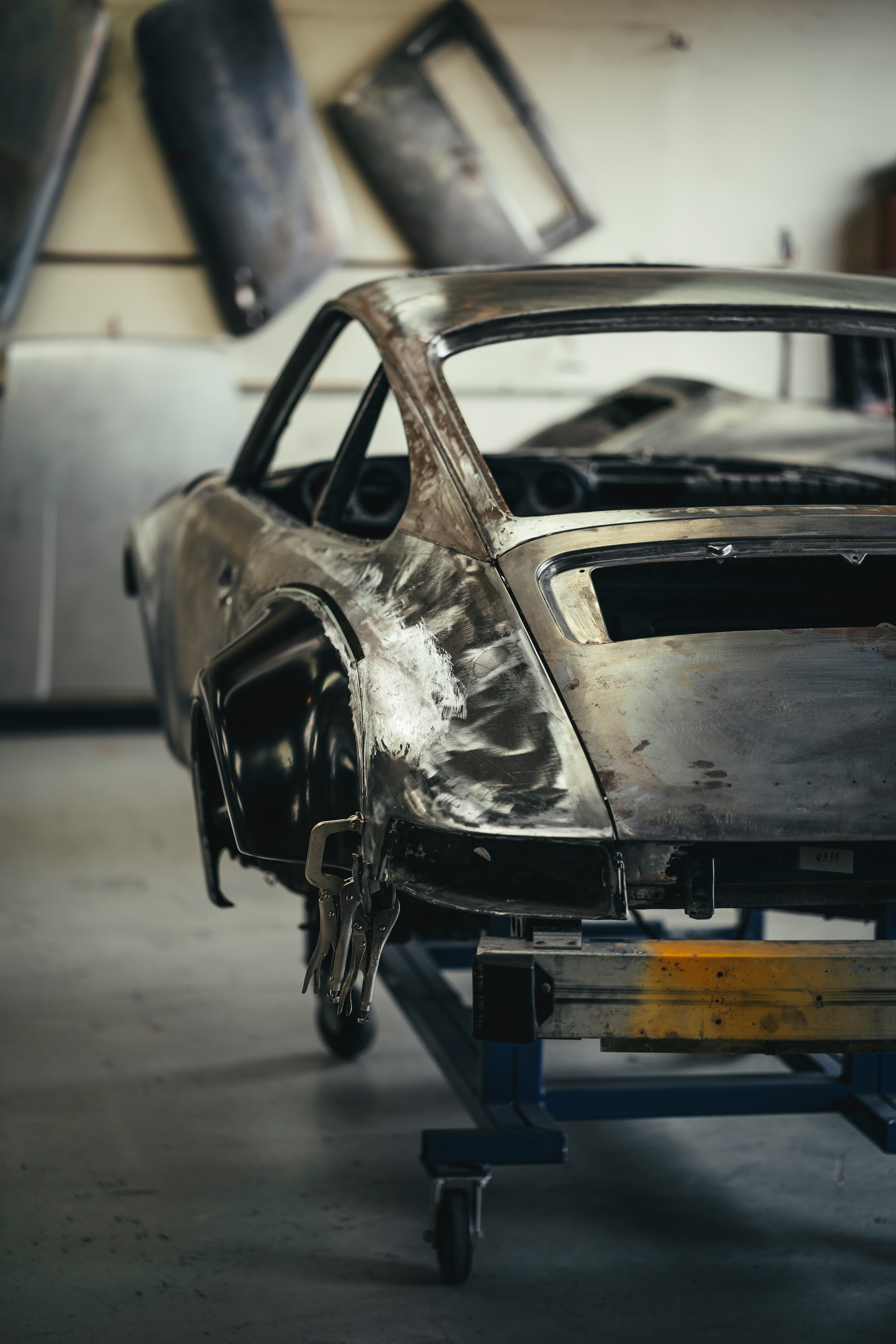 Cars awaiting restoration in the metal shop at CPR.