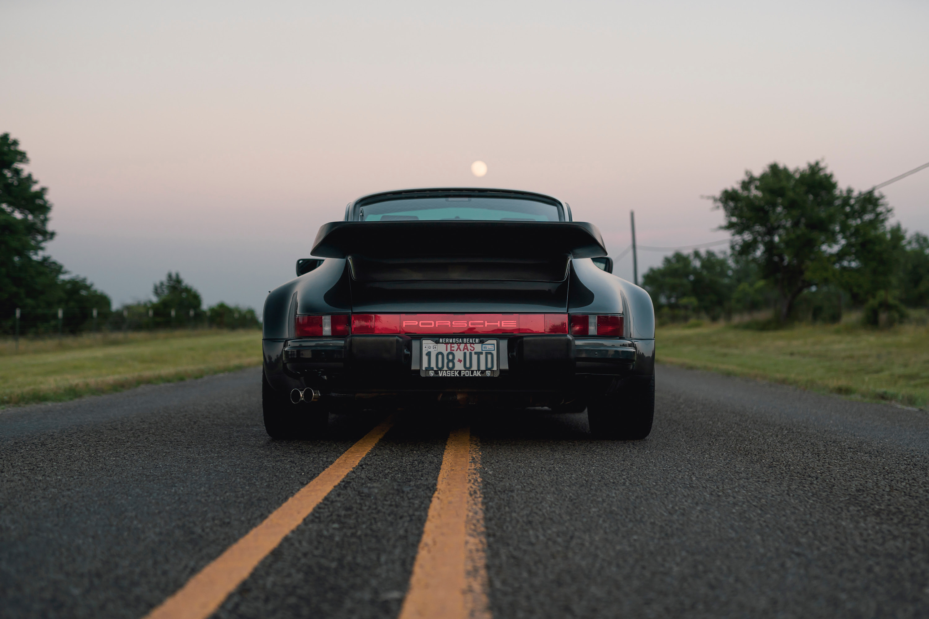 930 Turbo under the rising Texas moon.