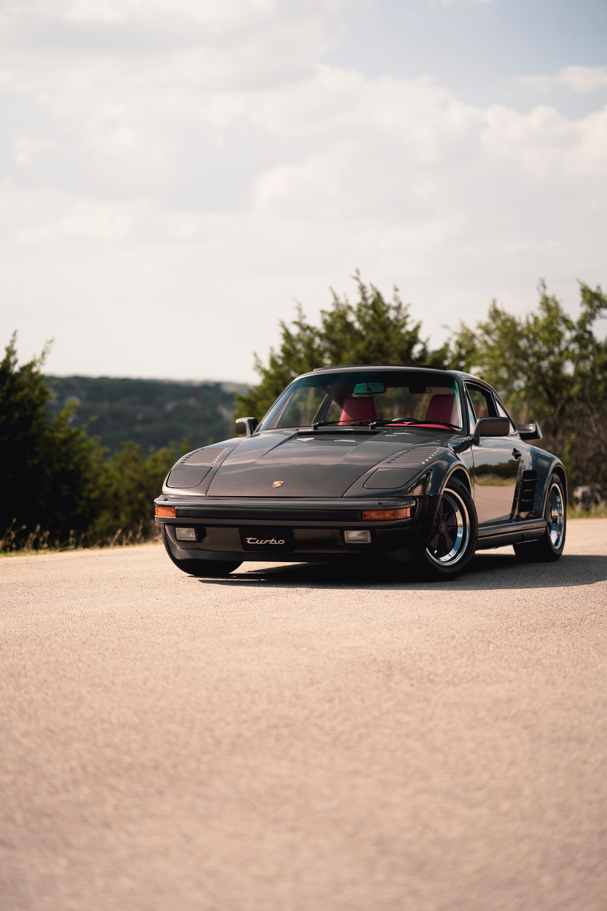 Driving a 930 Slantnose through Dripping Springs, TX.