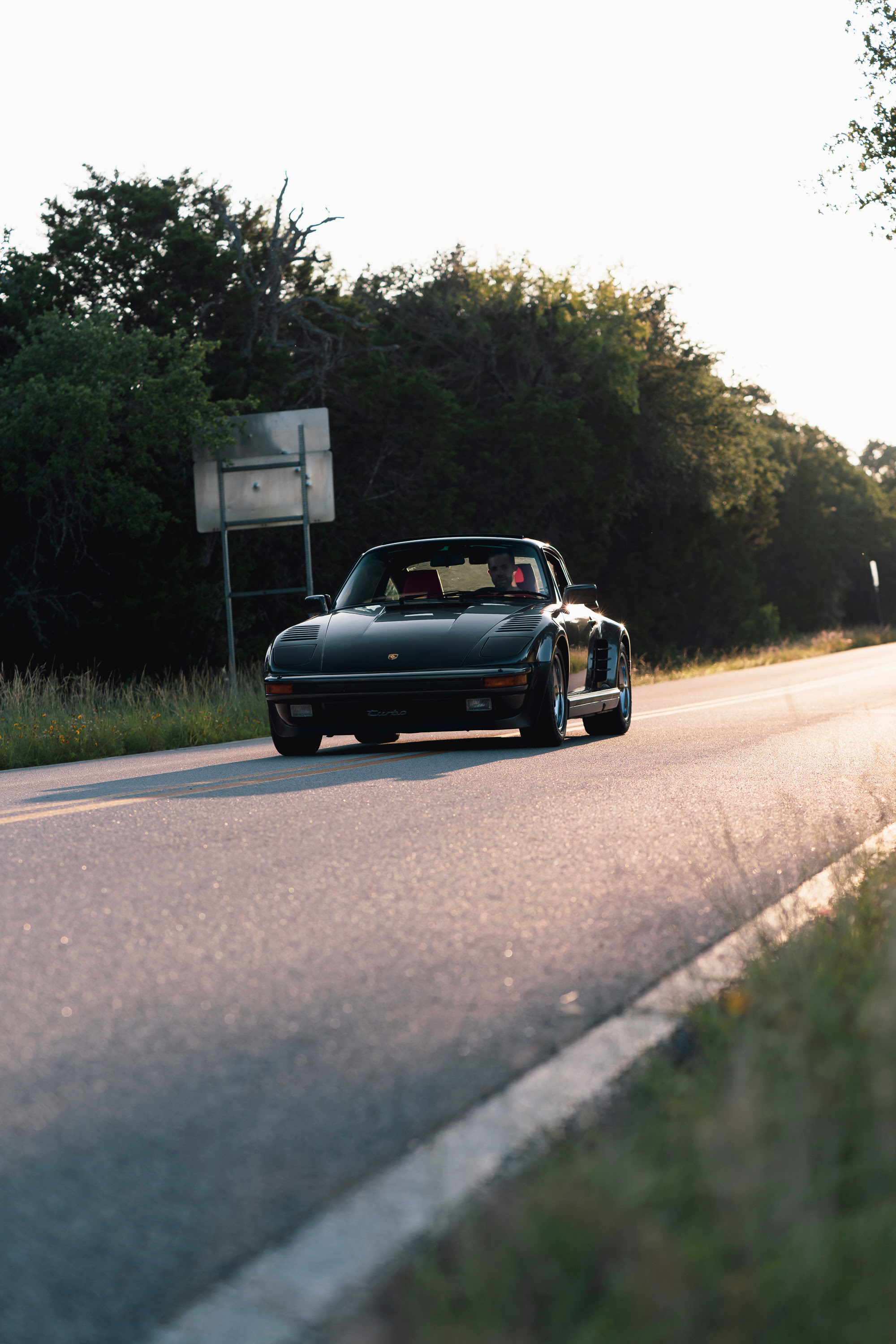 Driving a 930 Slantnose through Dripping Springs, TX.