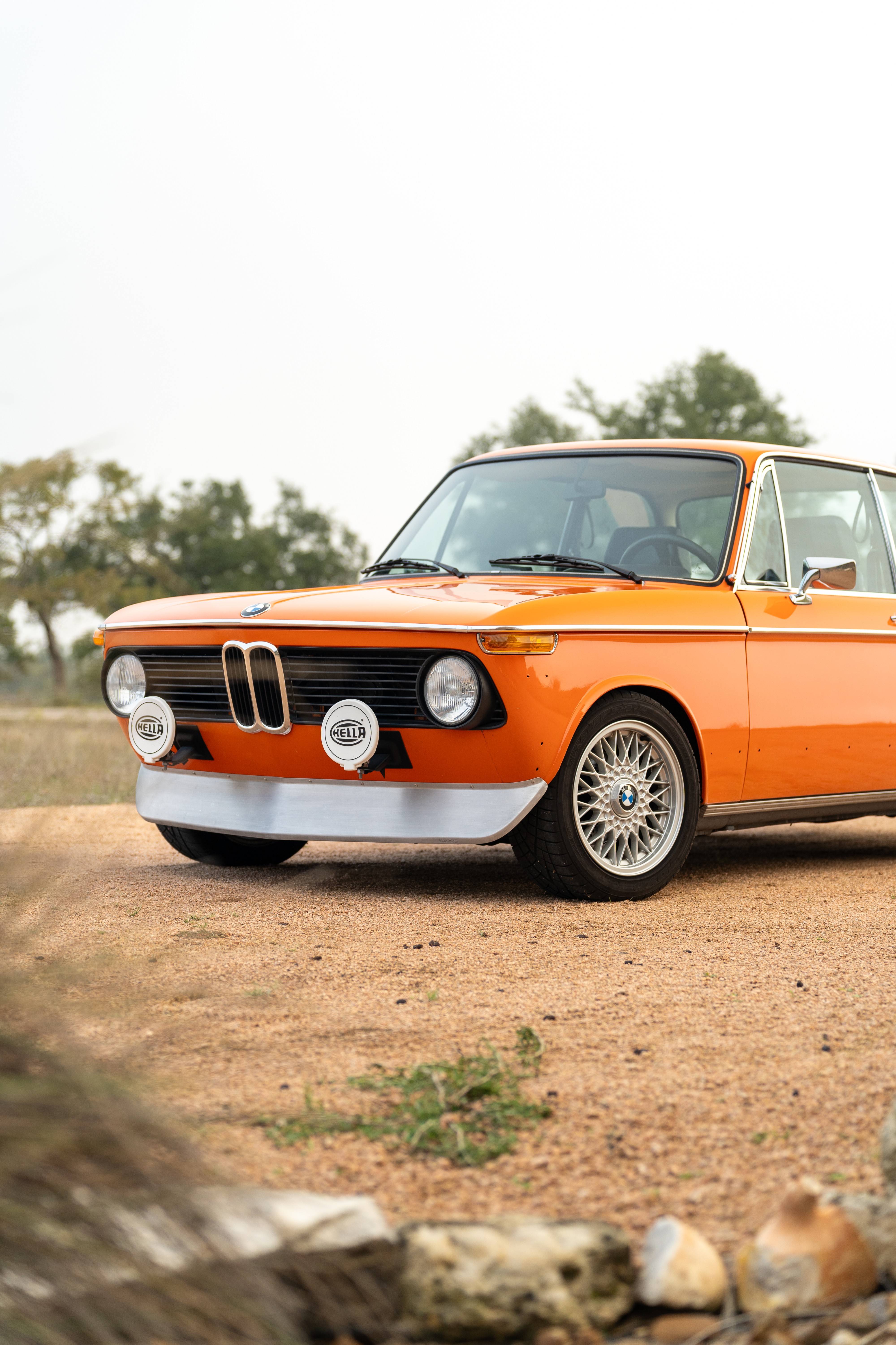 Orange 1976 BMW 2002 2.2L 5-Speed shot in Blanco, TX.