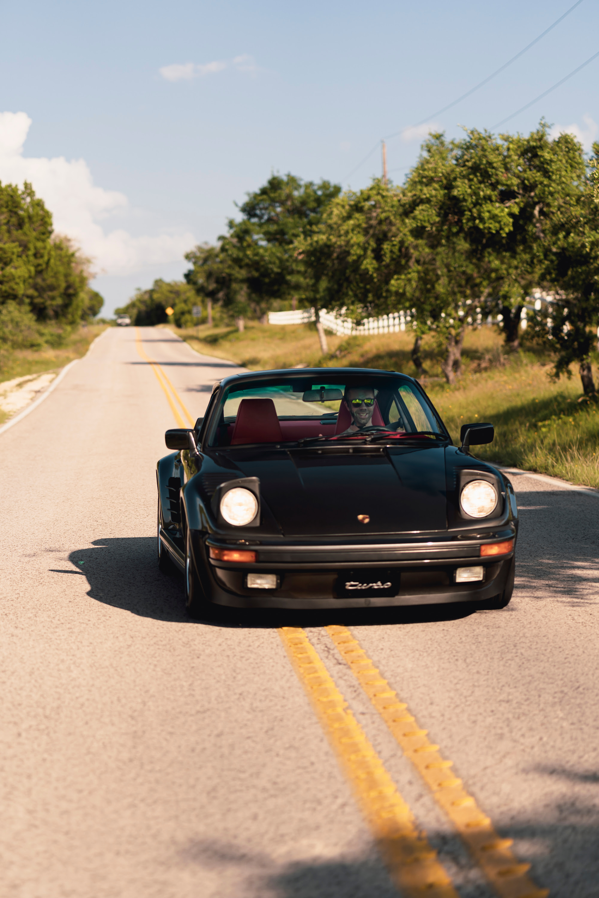 Driving a 930 Slantnose through Dripping Springs, TX.