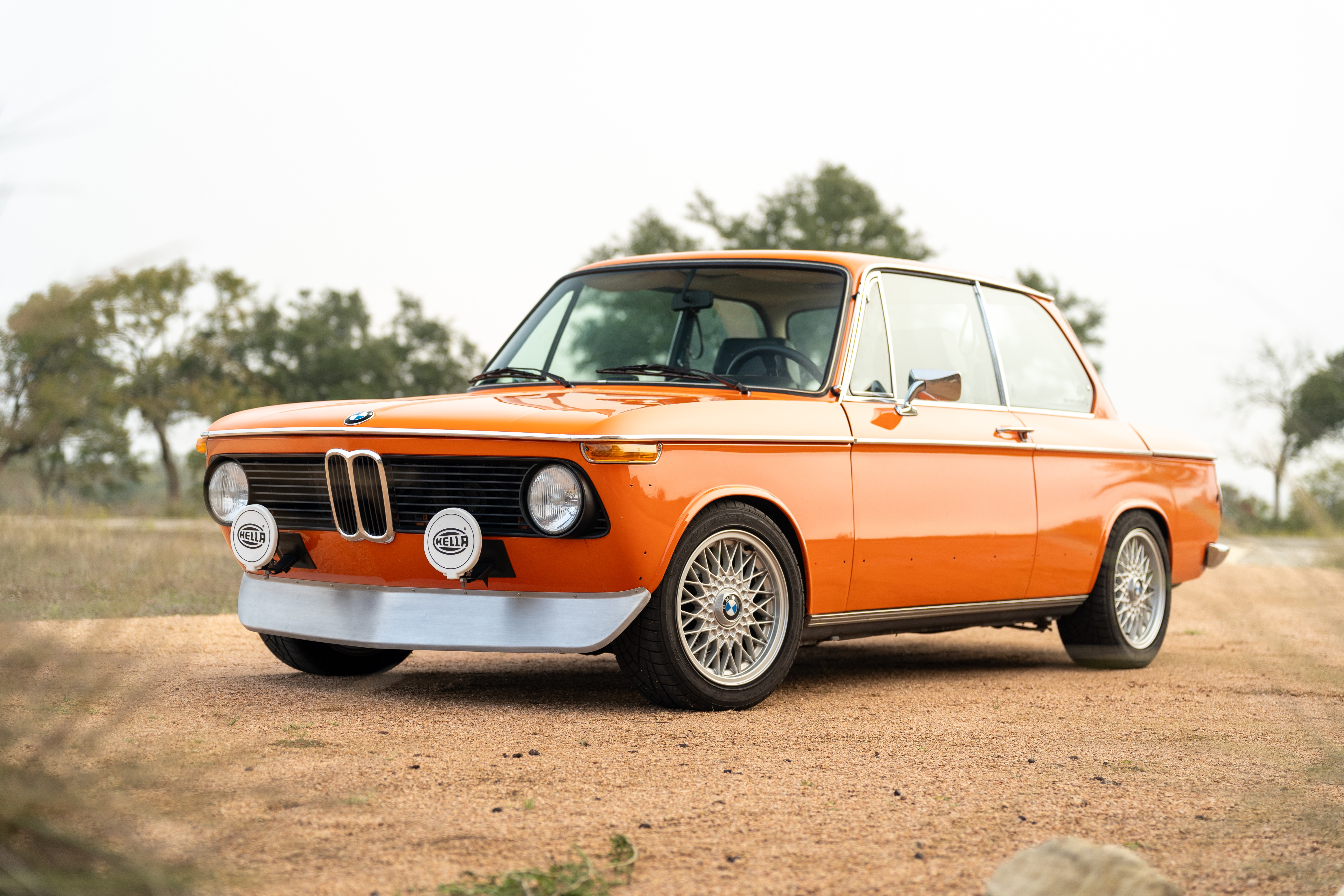 Orange 1976 BMW 2002 2.2L 5-Speed shot in Blanco, TX.