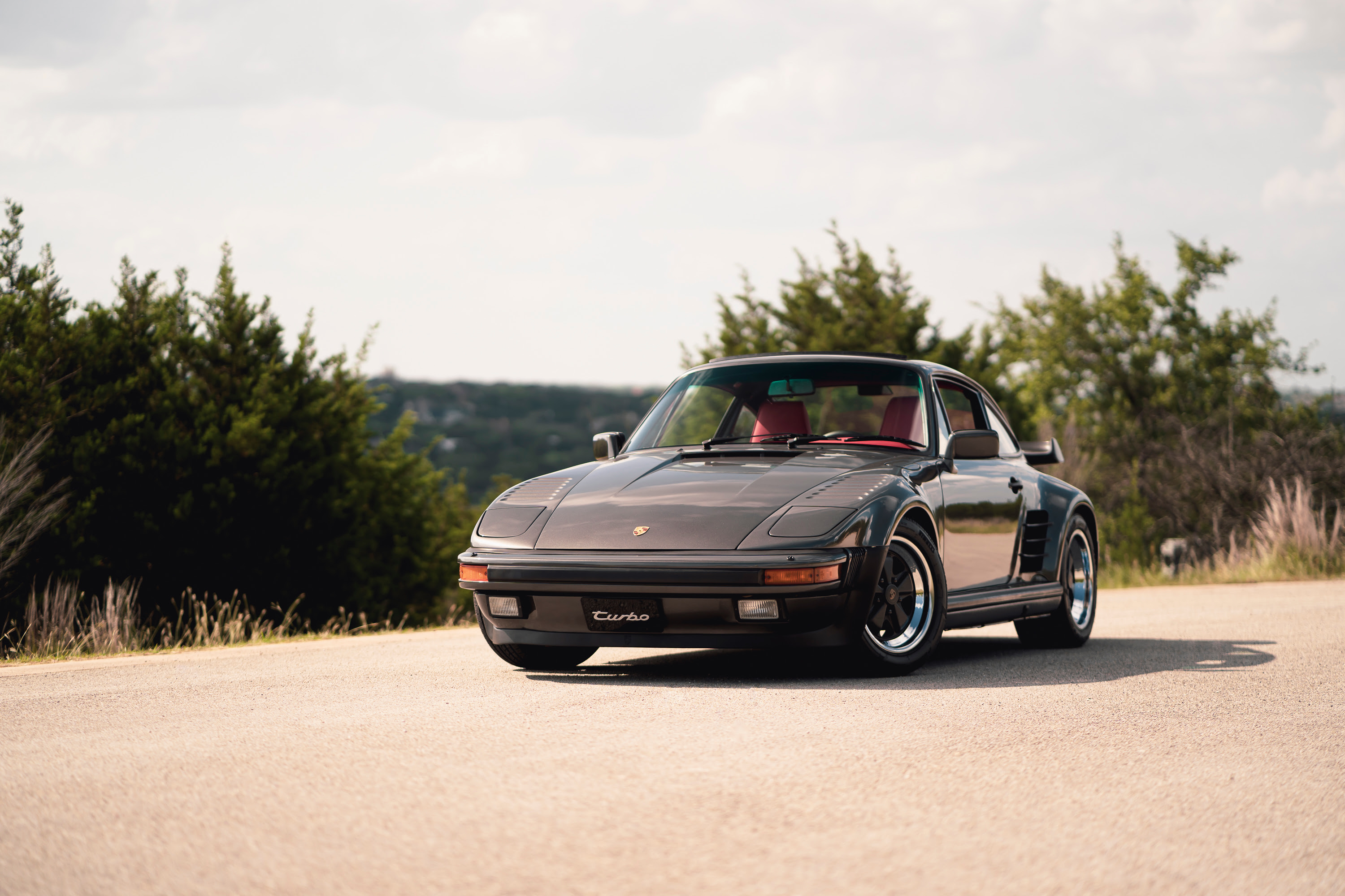 Driving a 930 Slantnose through Dripping Springs, TX.