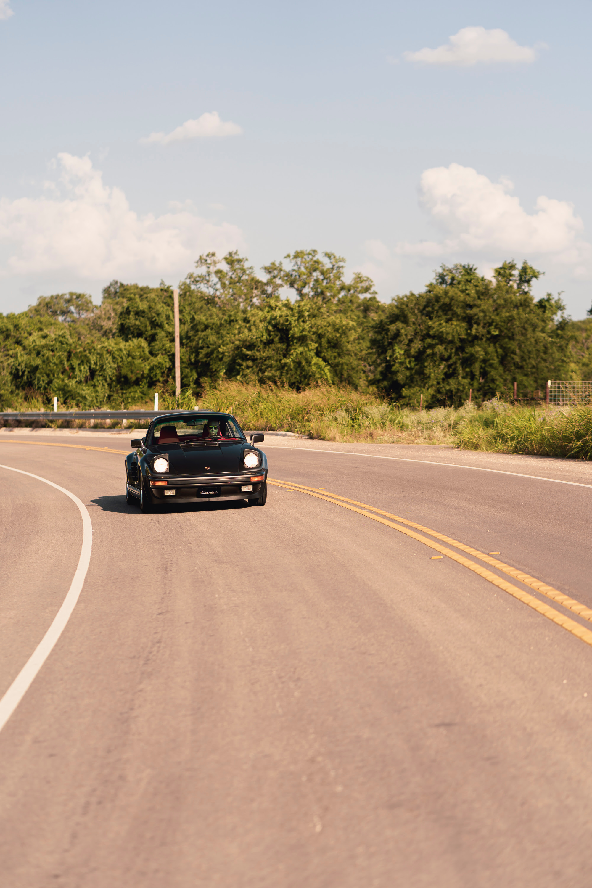 Driving a 930 Slantnose through Dripping Springs, TX.