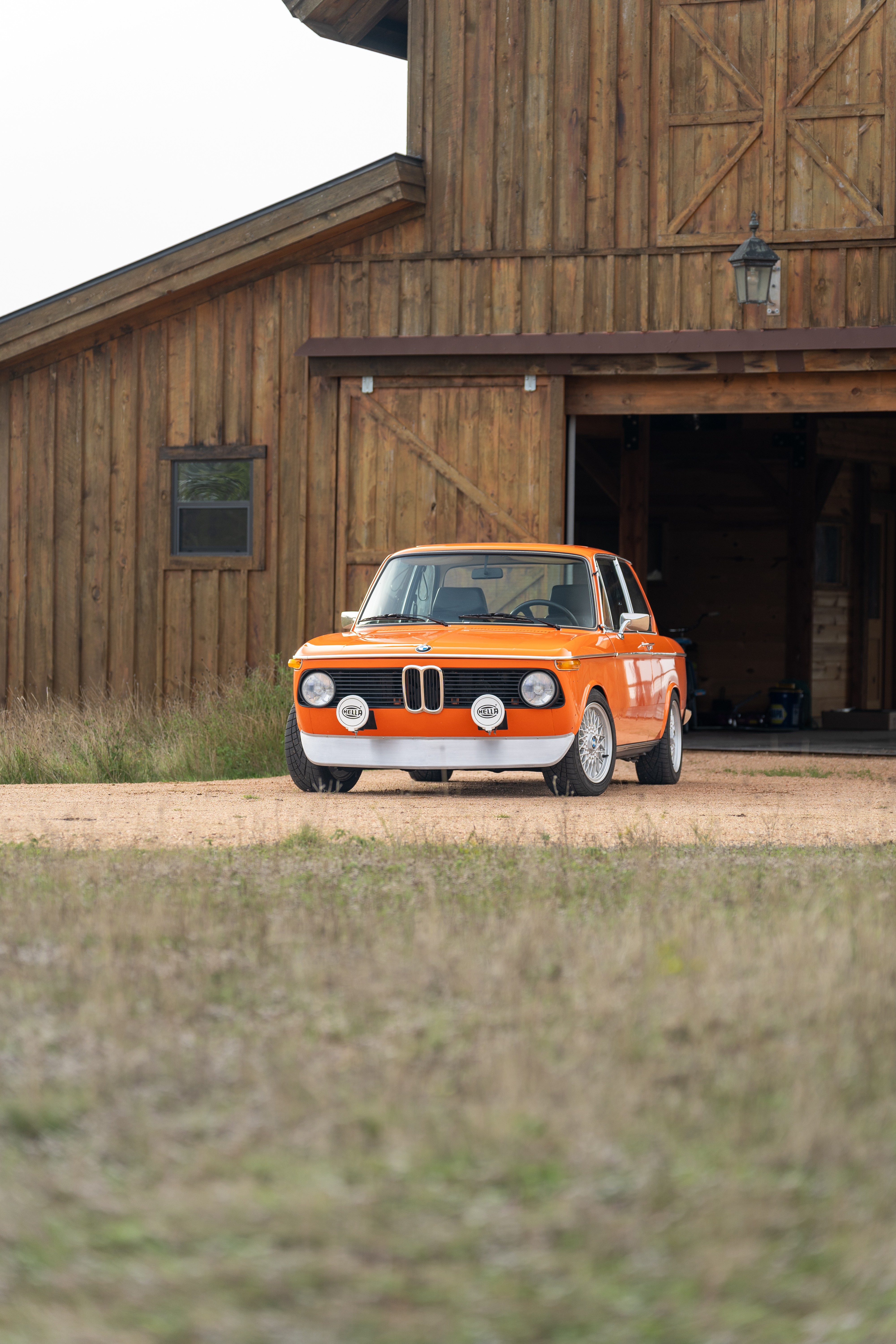 Orange 1976 BMW 2002 2.2L 5-Speed shot in Blanco, TX.