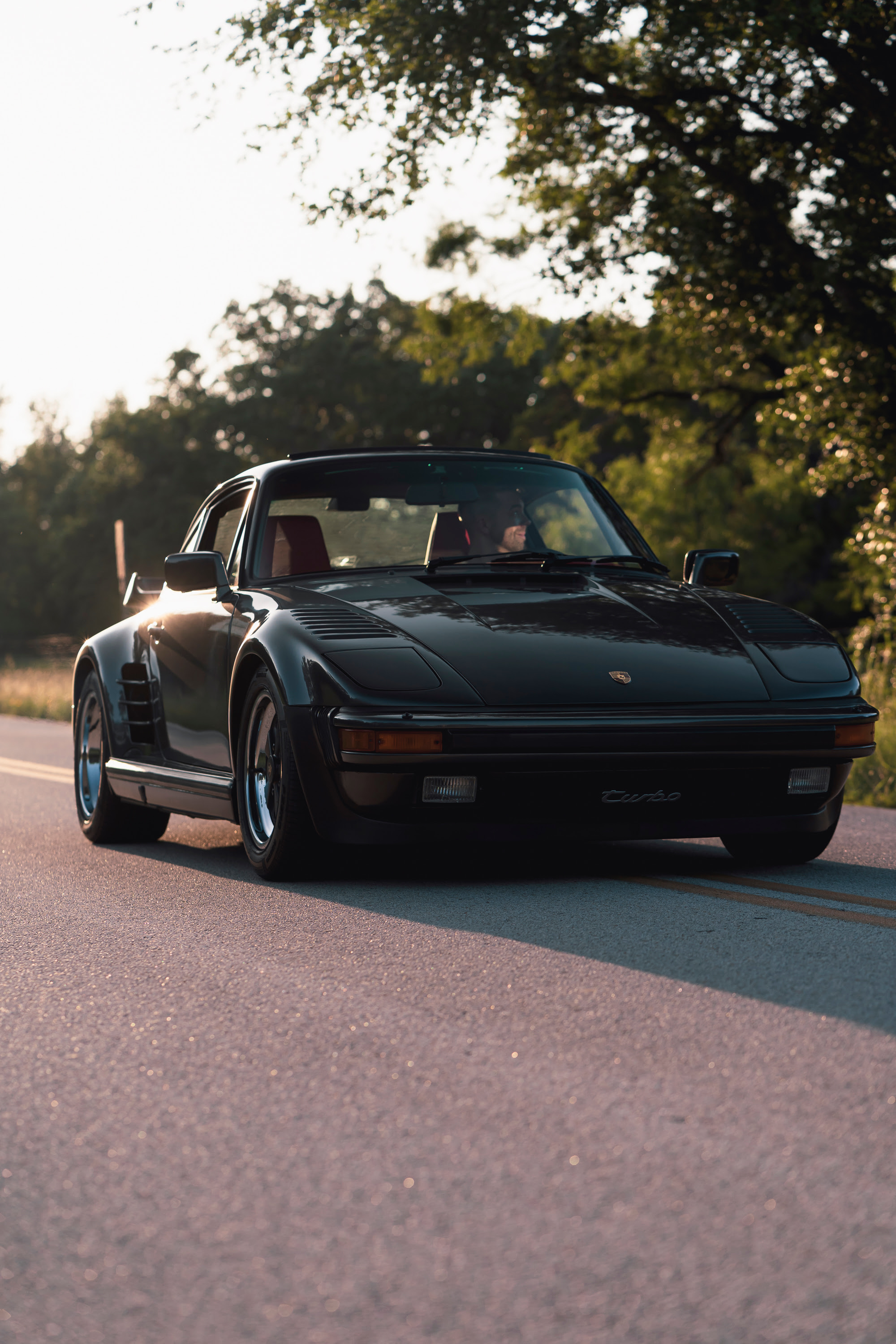 Driving a 930 Slantnose through Dripping Springs, TX.