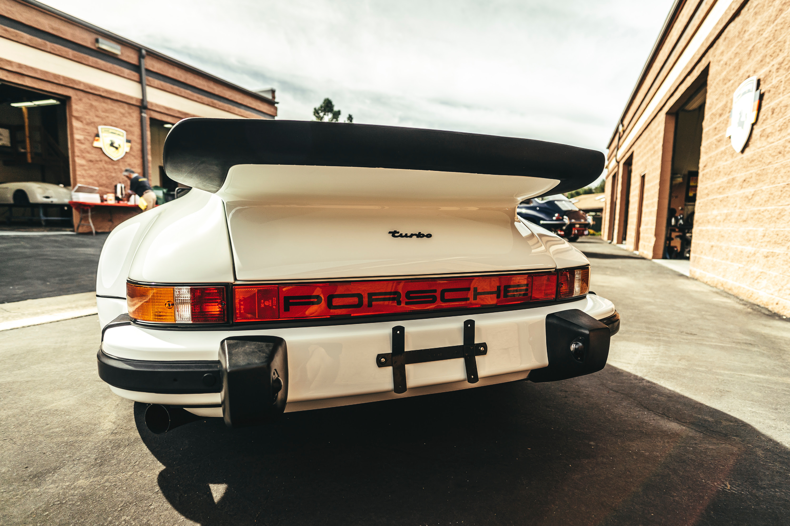 White 911 Turbo badge at CPR.