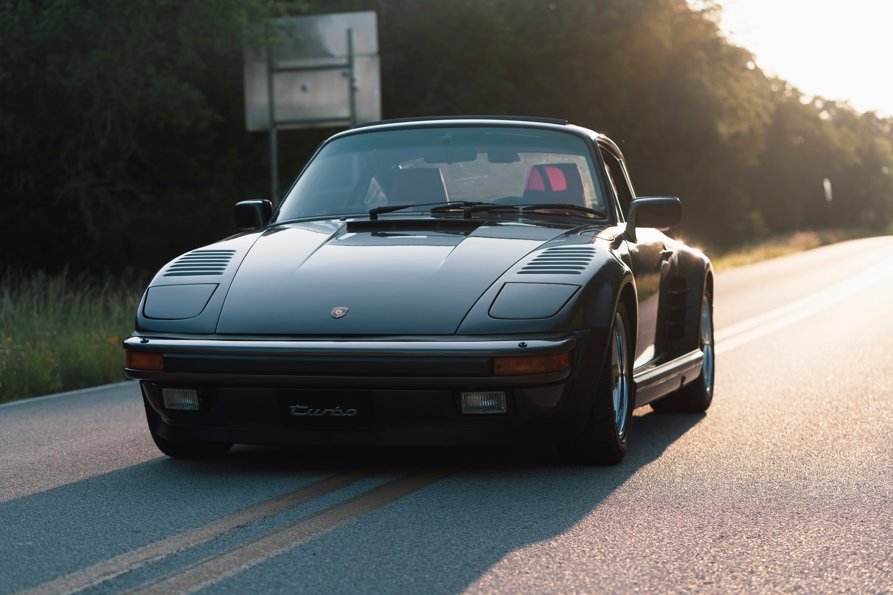 Driving a 930 Slantnose through Dripping Springs, TX.