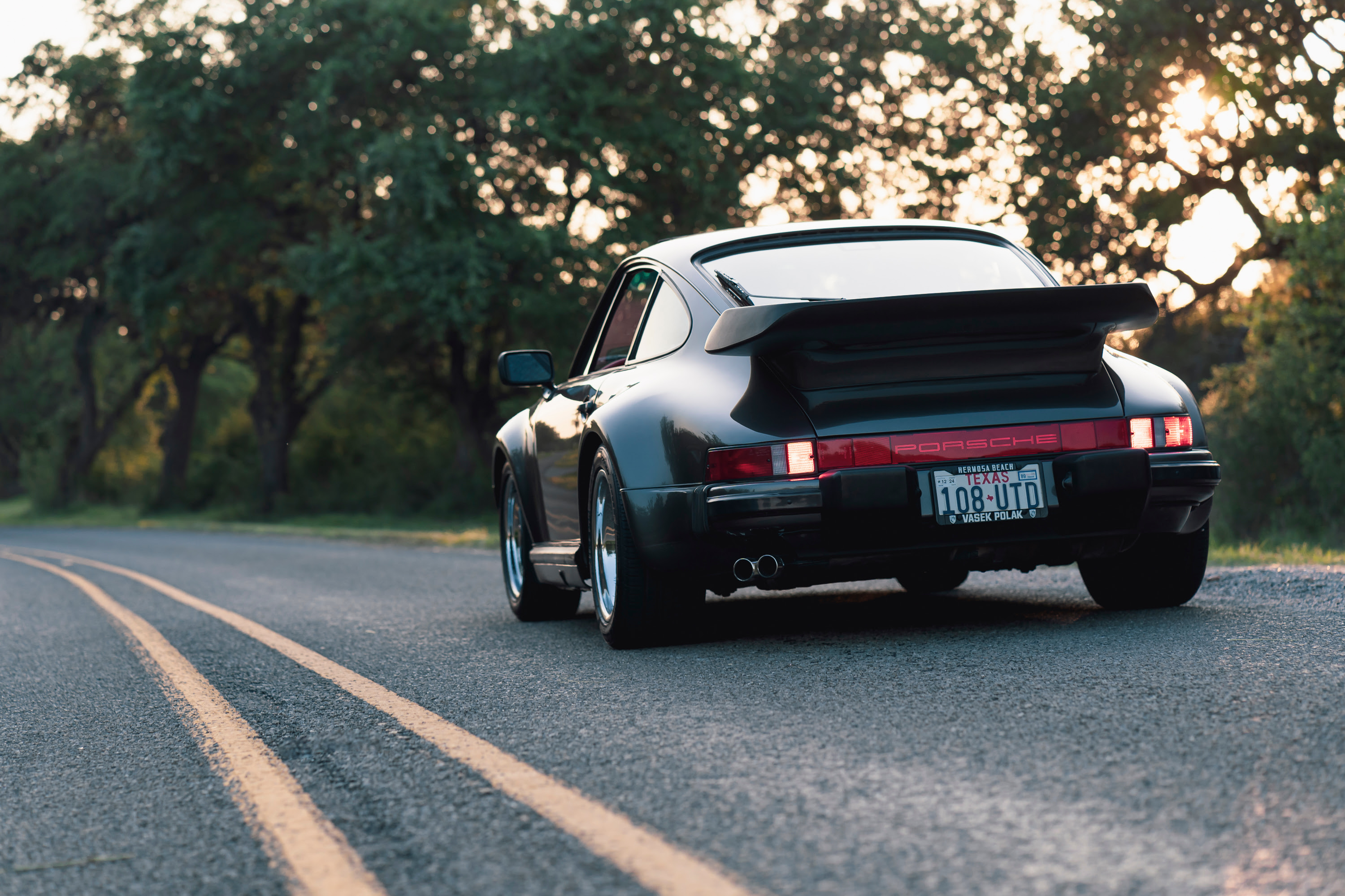 Driving a 930 Slantnose through Dripping Springs, TX.