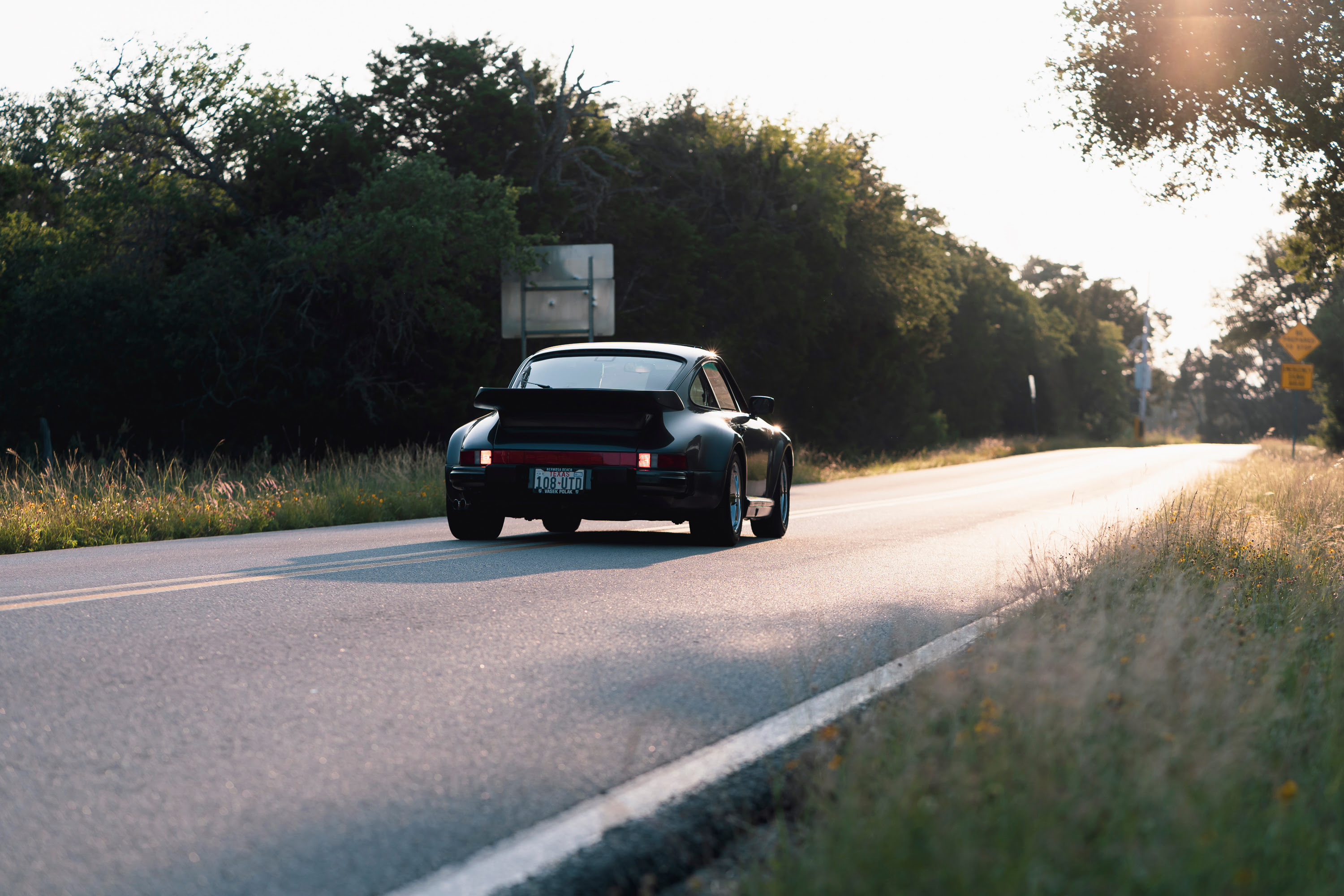 Driving a 930 Slantnose through Dripping Springs, TX.