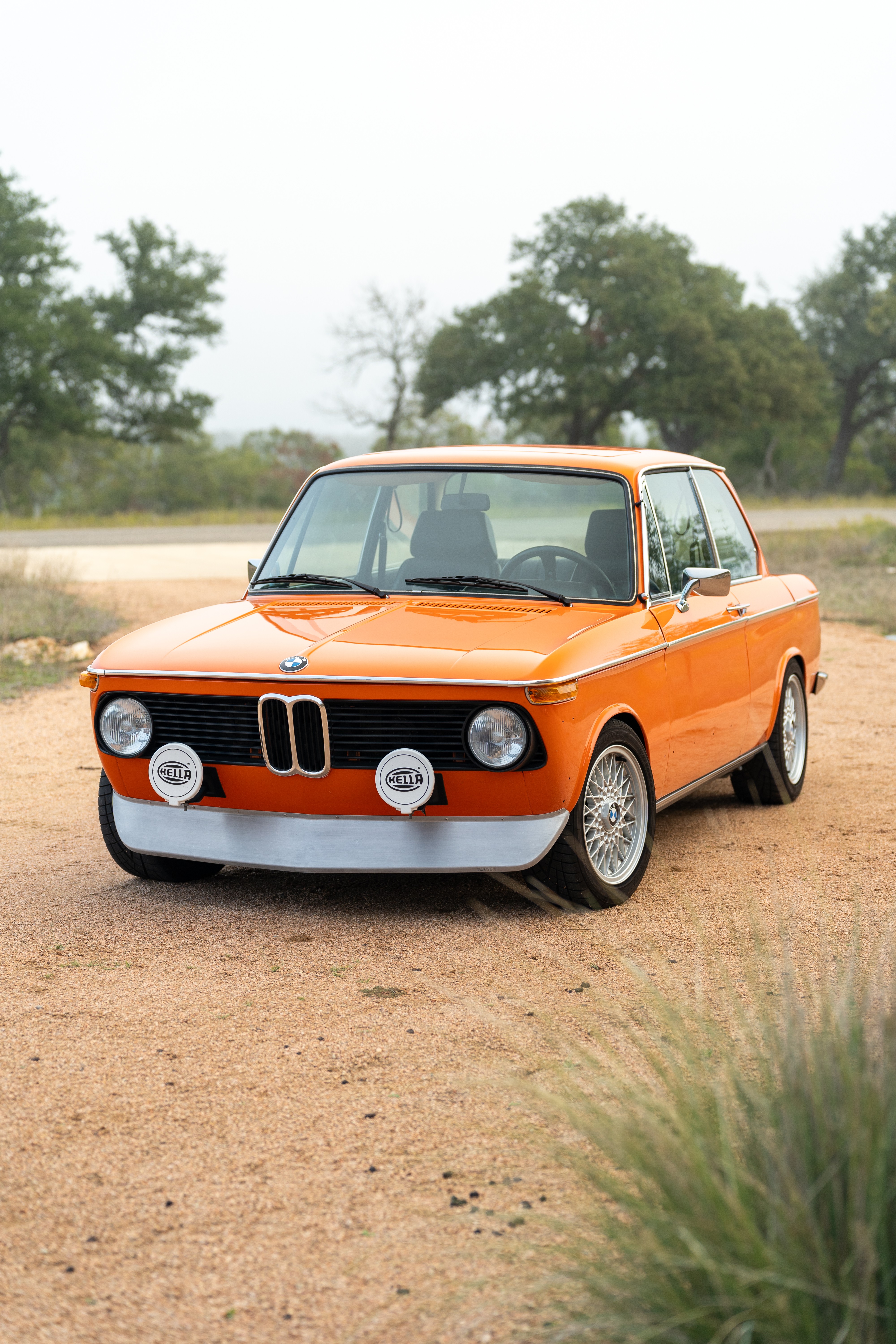 Orange 1976 BMW 2002 2.2L 5-Speed shot in Blanco, TX.