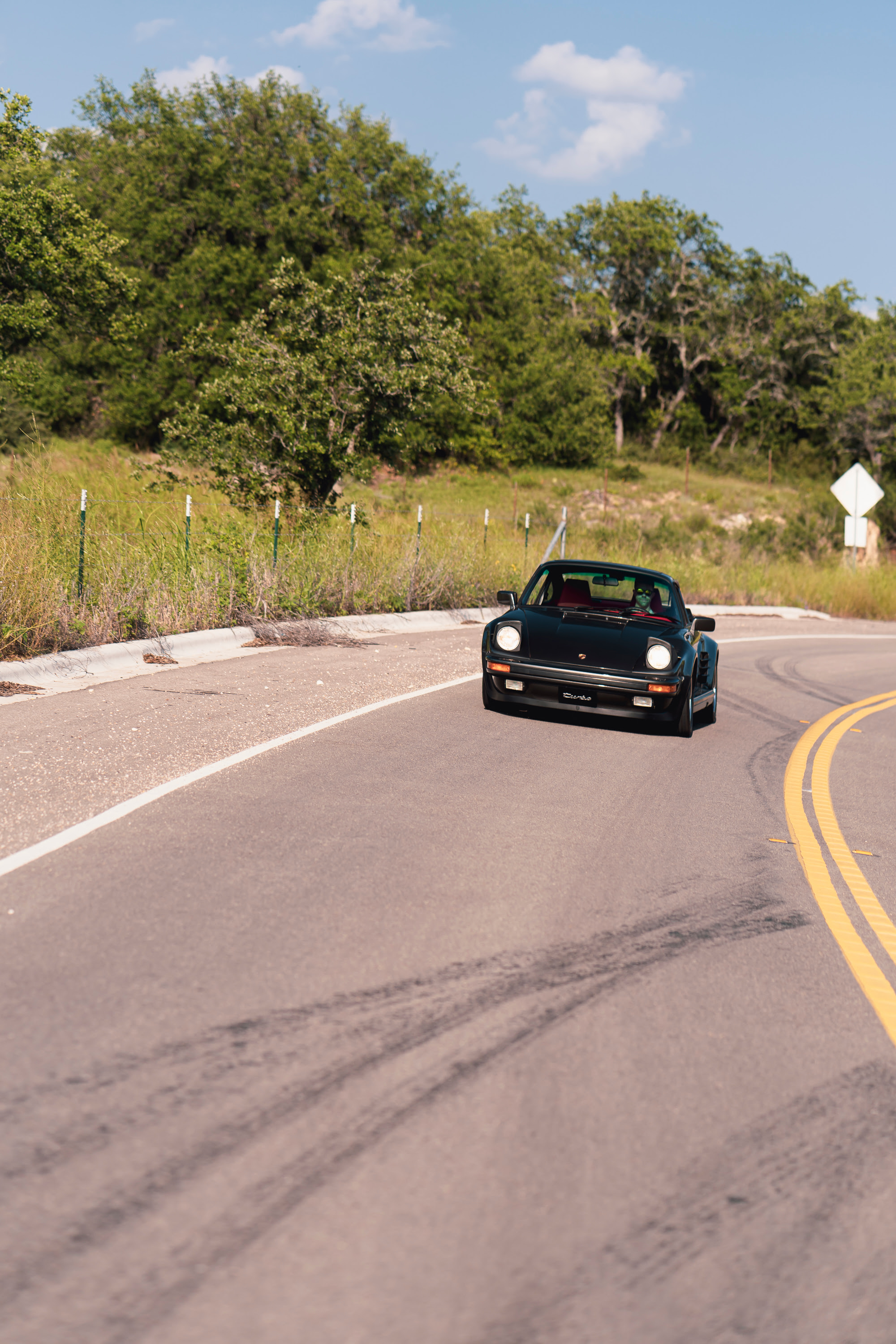 Driving a 930 Slantnose through Dripping Springs, TX.