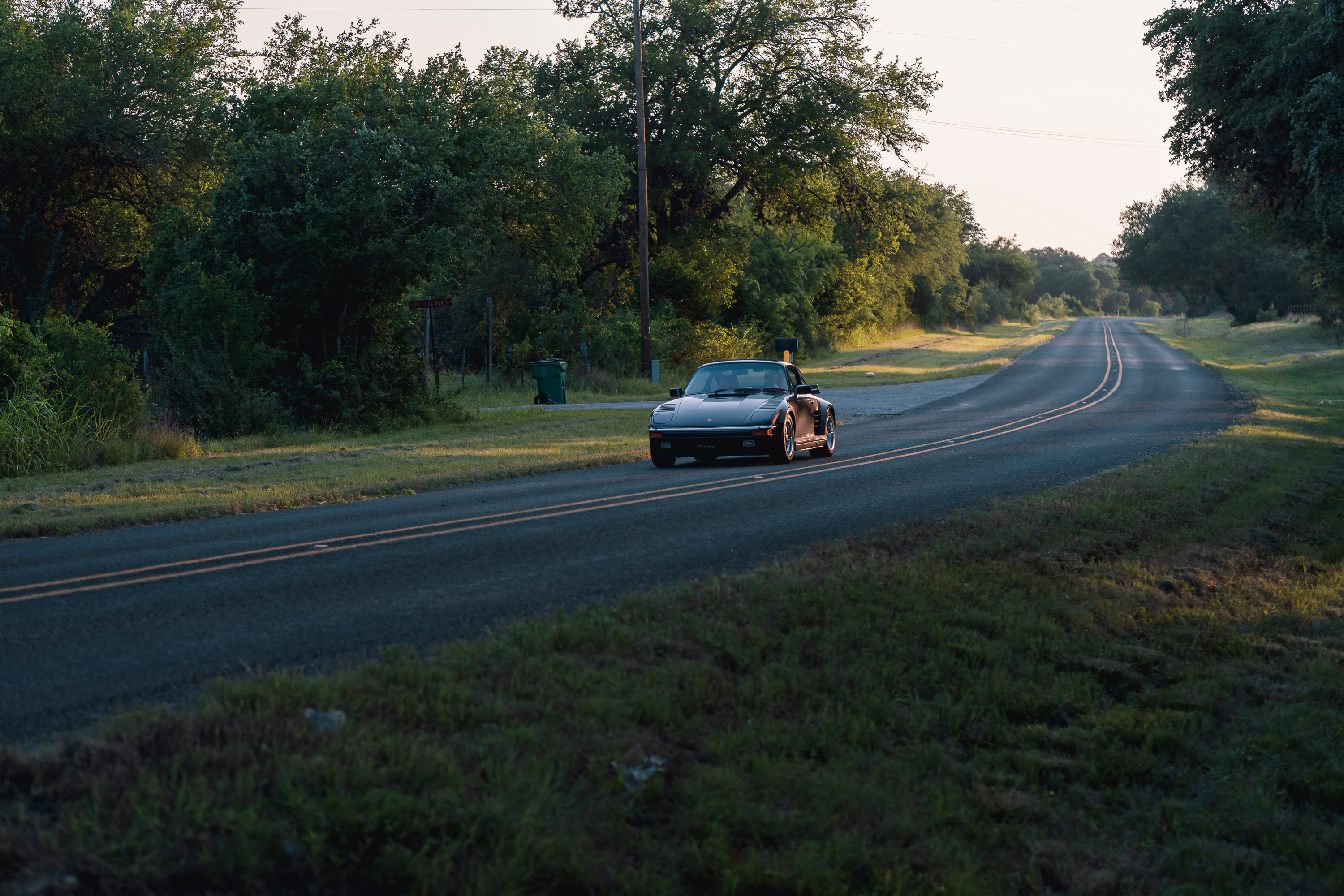 Driving a 930 Slantnose through Dripping Springs, TX.