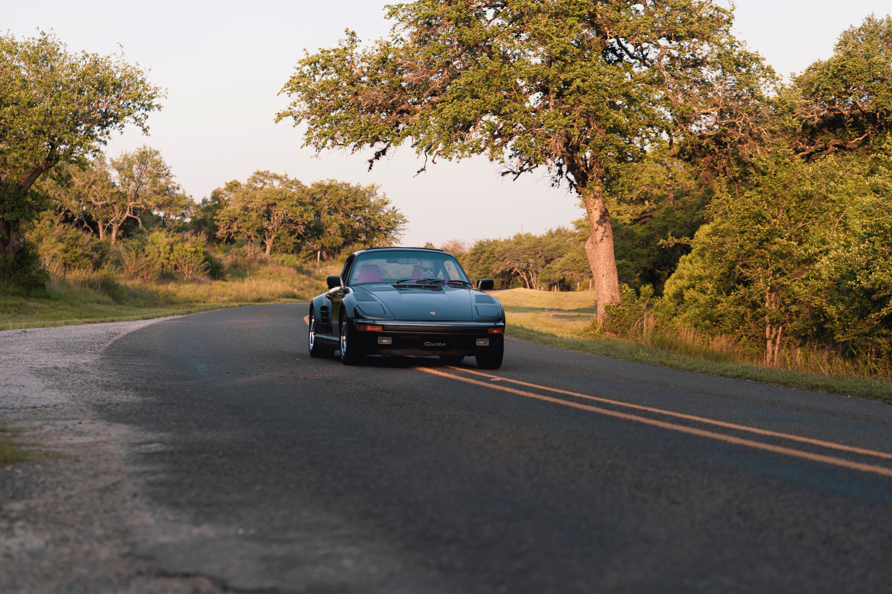 Driving a 930 Slantnose through Dripping Springs, TX.