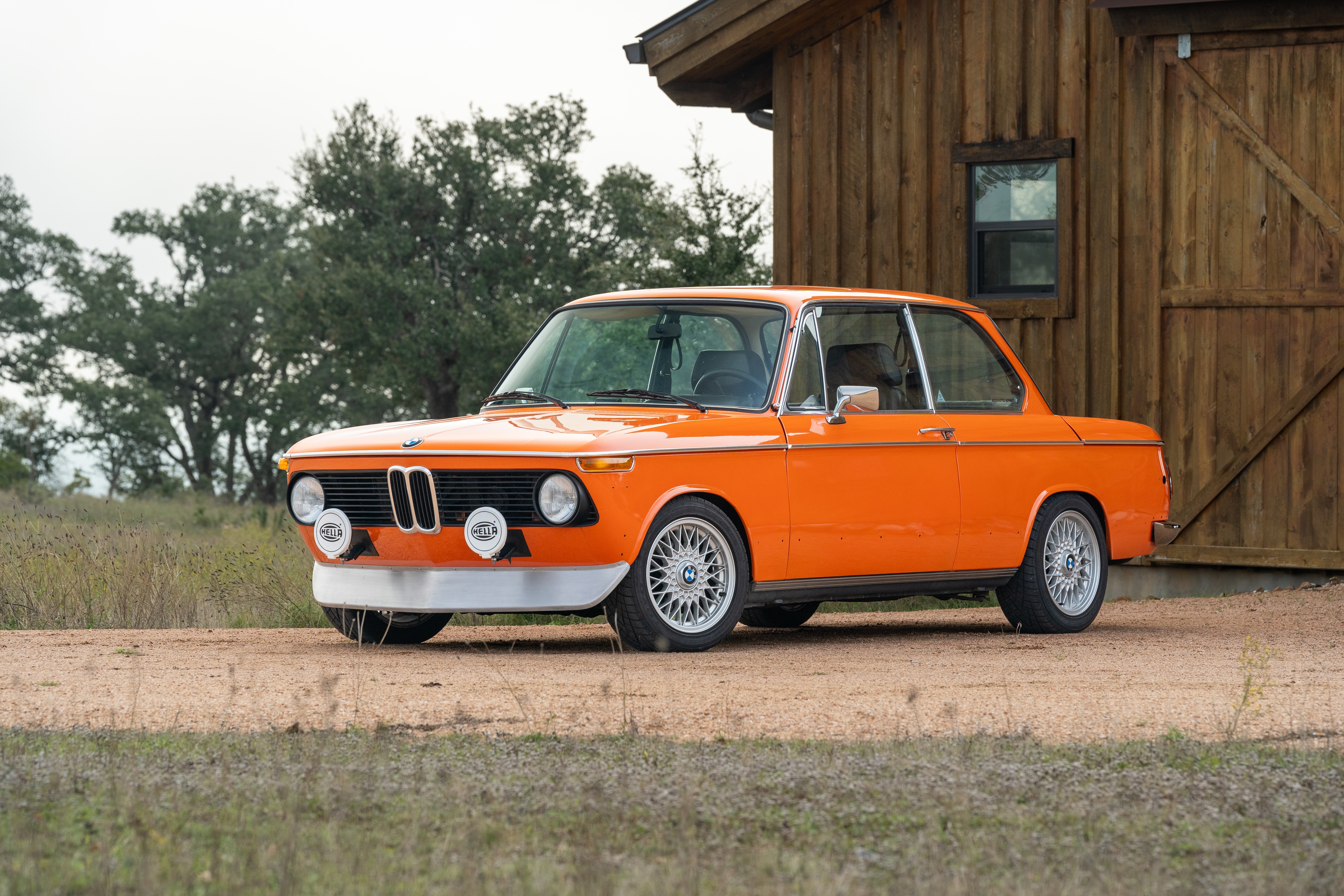 Orange 1976 BMW 2002 2.2L 5-Speed shot in Blanco, TX.