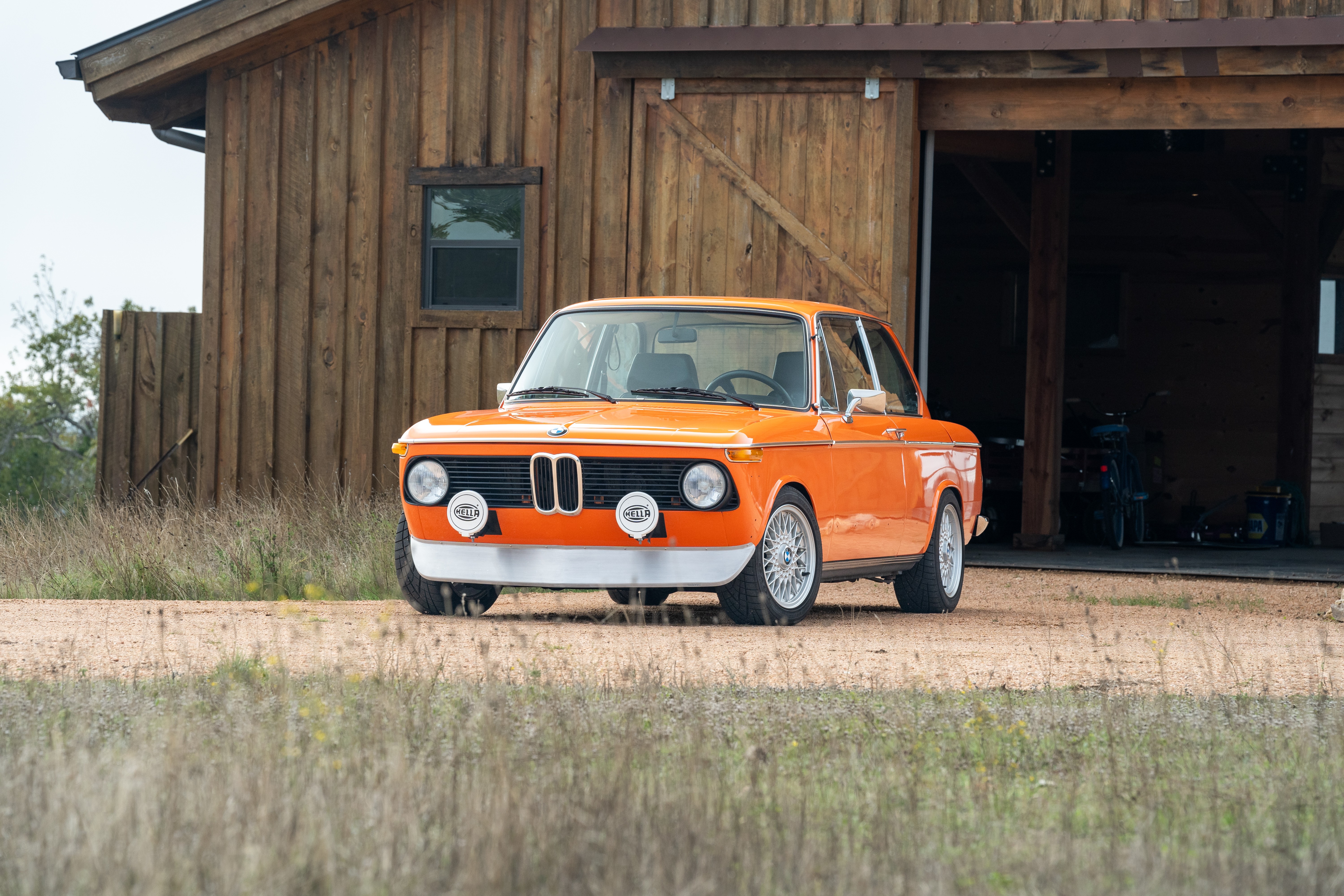 Orange 1976 BMW 2002 2.2L 5-Speed shot in Blanco, TX.