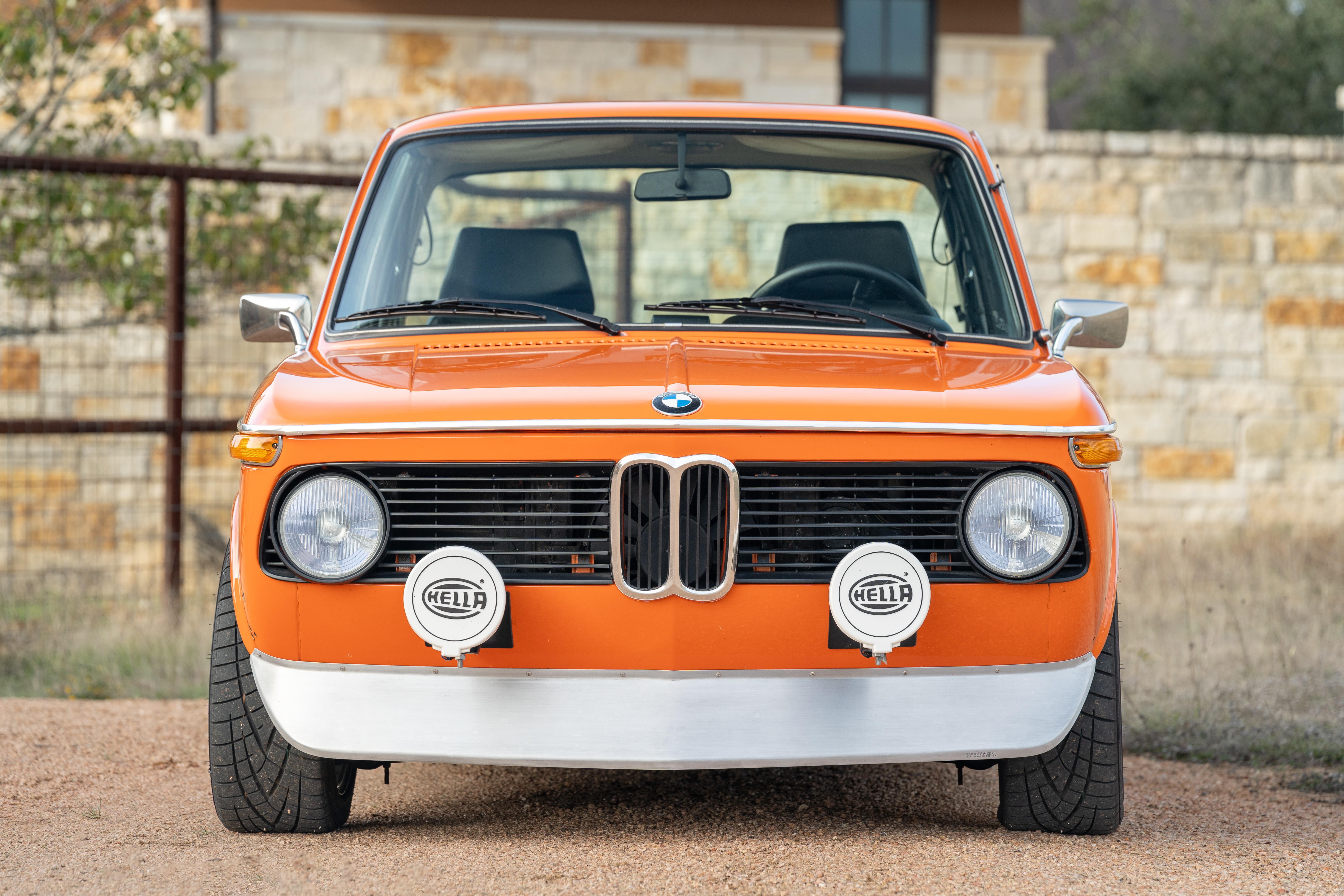 Orange 1976 BMW 2002 2.2L 5-Speed shot in Blanco, TX.