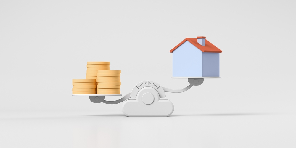 Image of money and a house on a scale