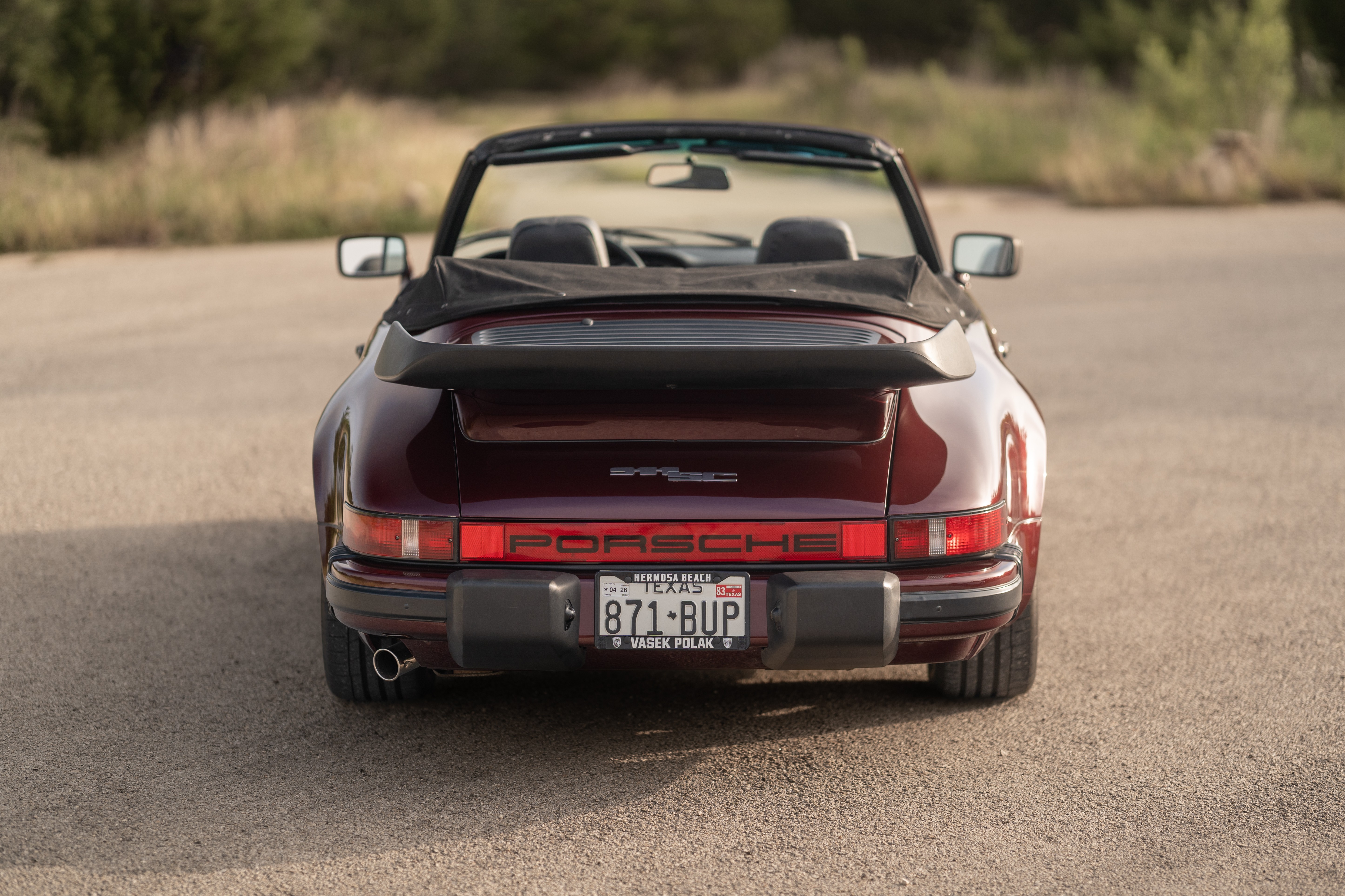 1983 Porsche 911SC Cabriolet in Metallic Red shot in Austin, TX.