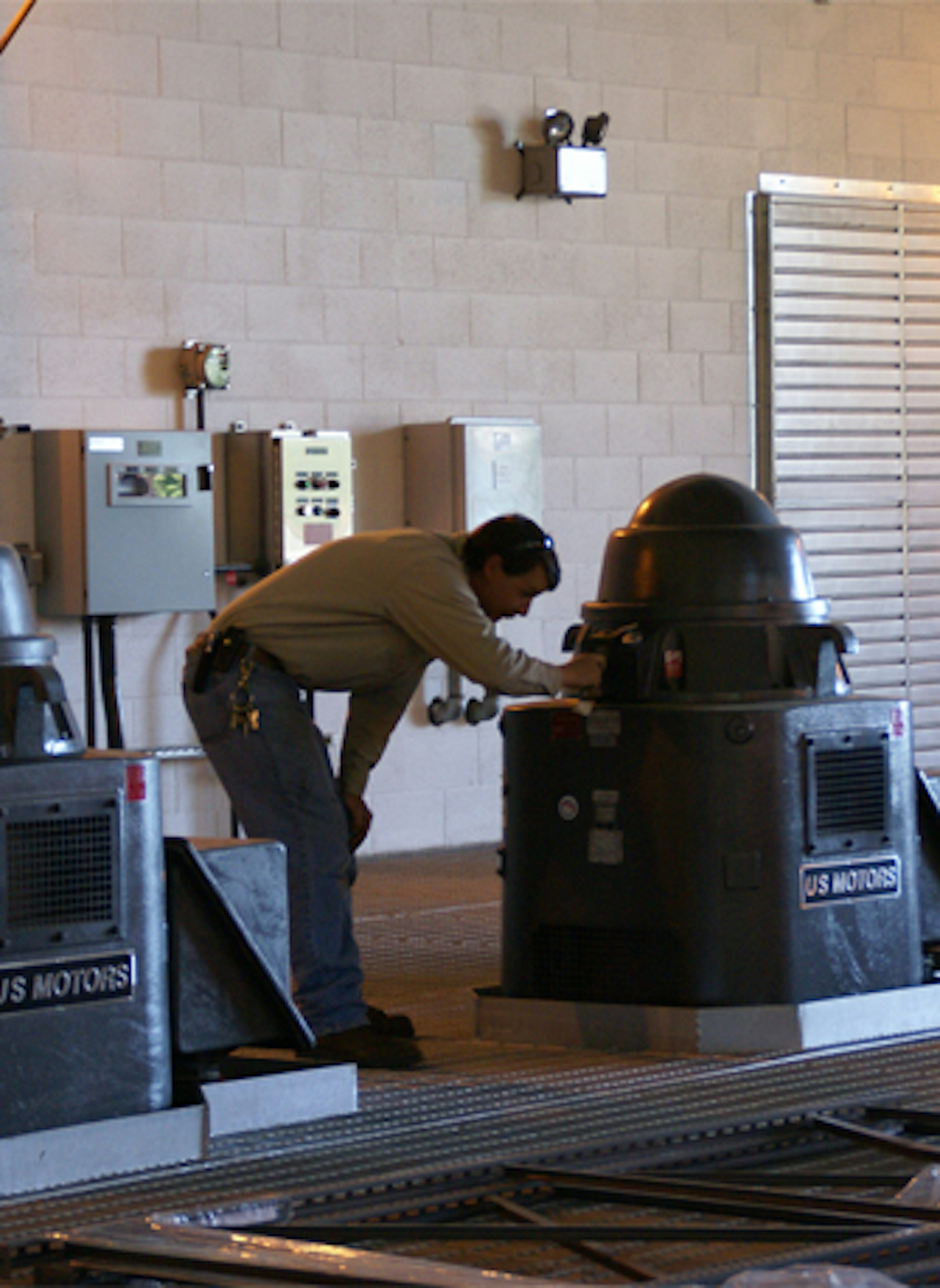 Photo of PCWA Employee in shop