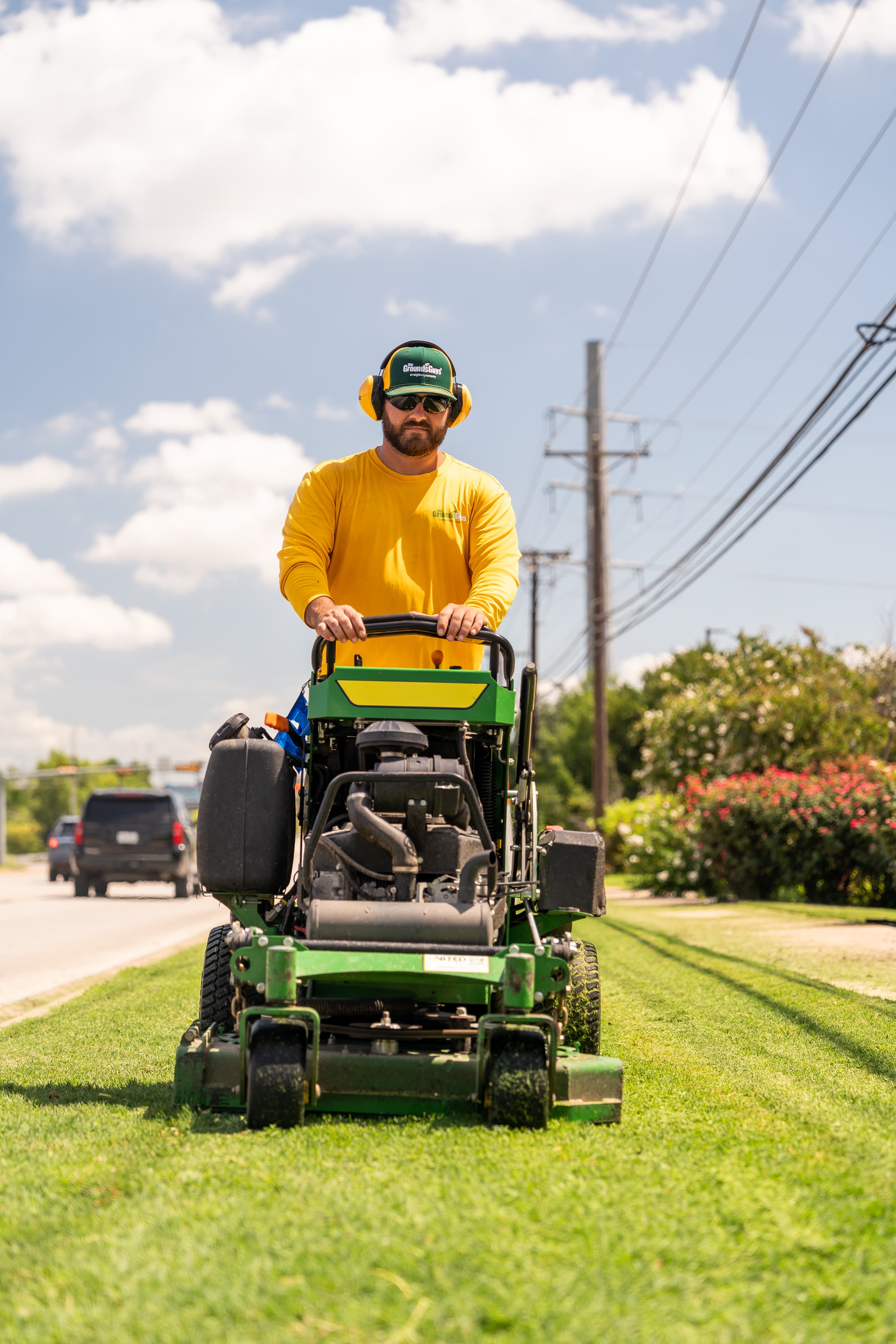 Grounds Guys maintenance crew working on a commercial landscaping project.