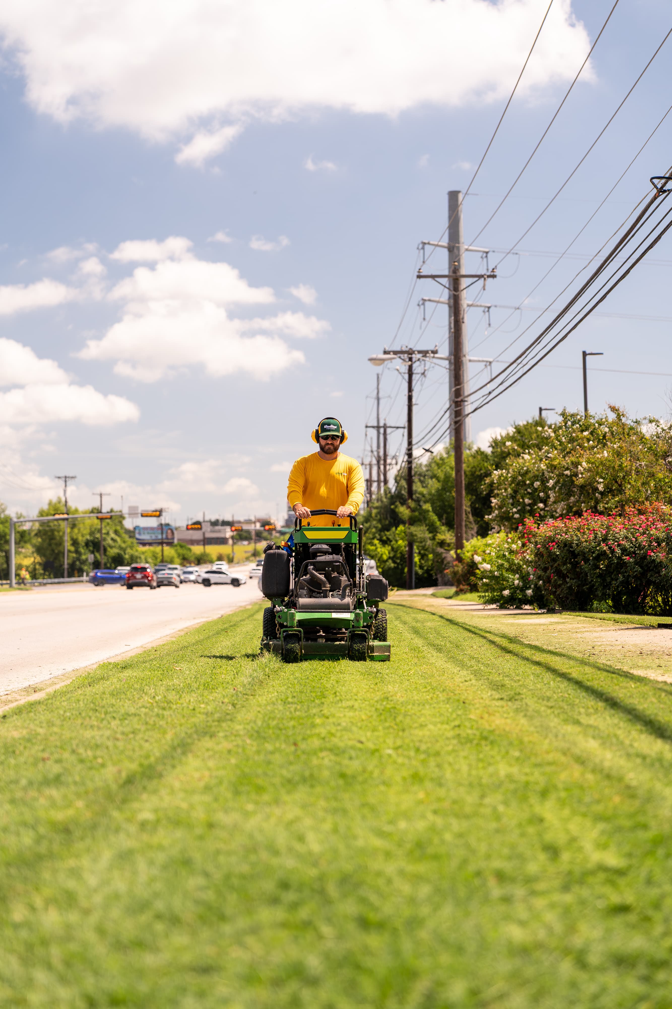 Grounds Guys maintenance crew working on a commercial landscaping project.