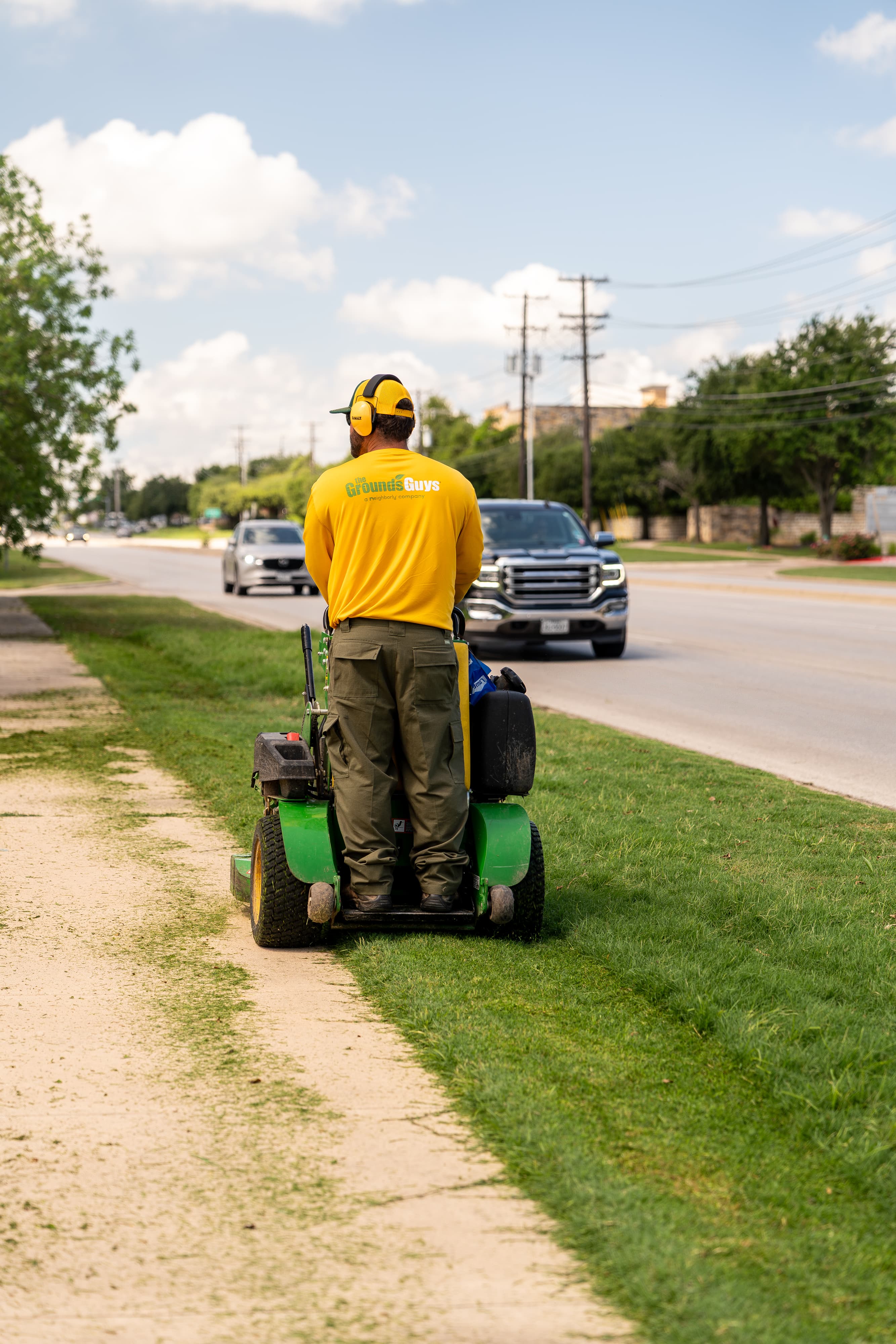 Grounds Guys maintenance crew working on a commercial landscaping project.