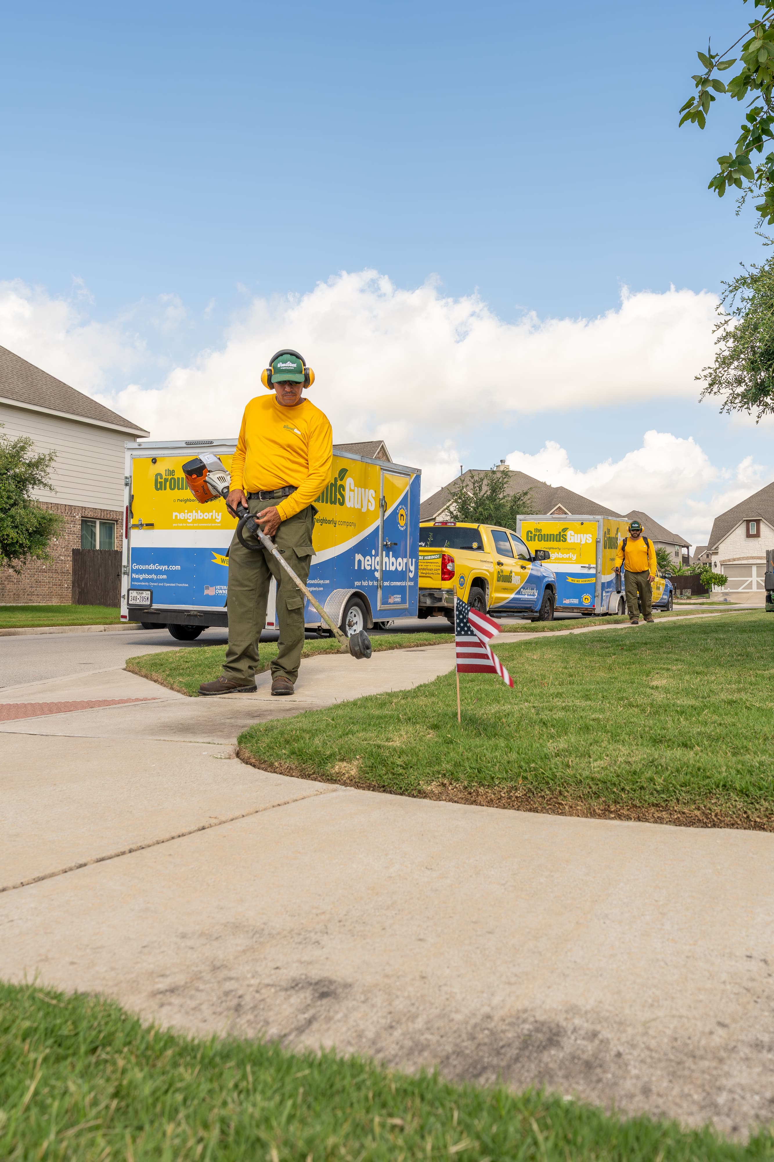 Grounds Guys maintenance crew at a customers house.