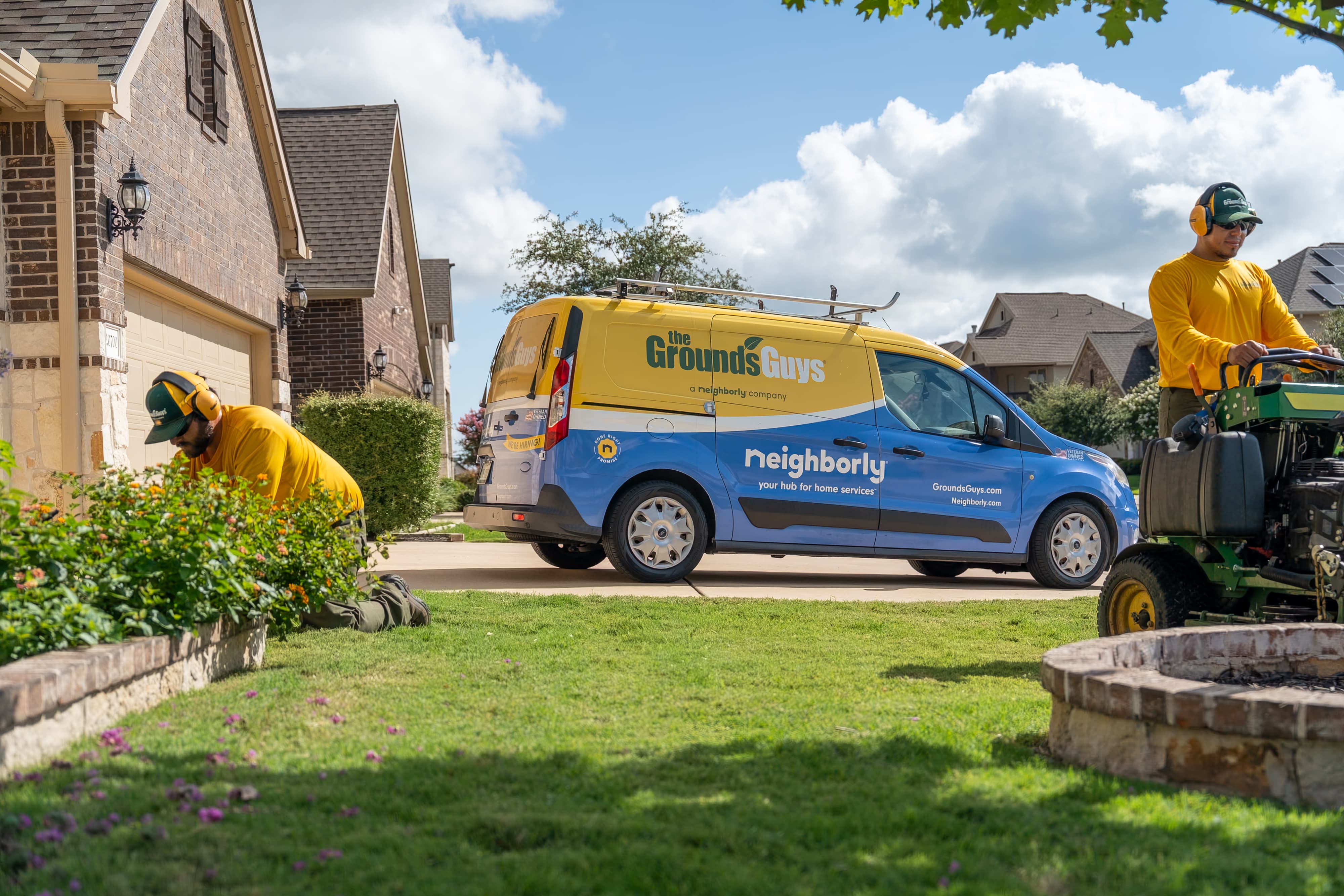 Grounds Guys maintenance crew at a customers house.