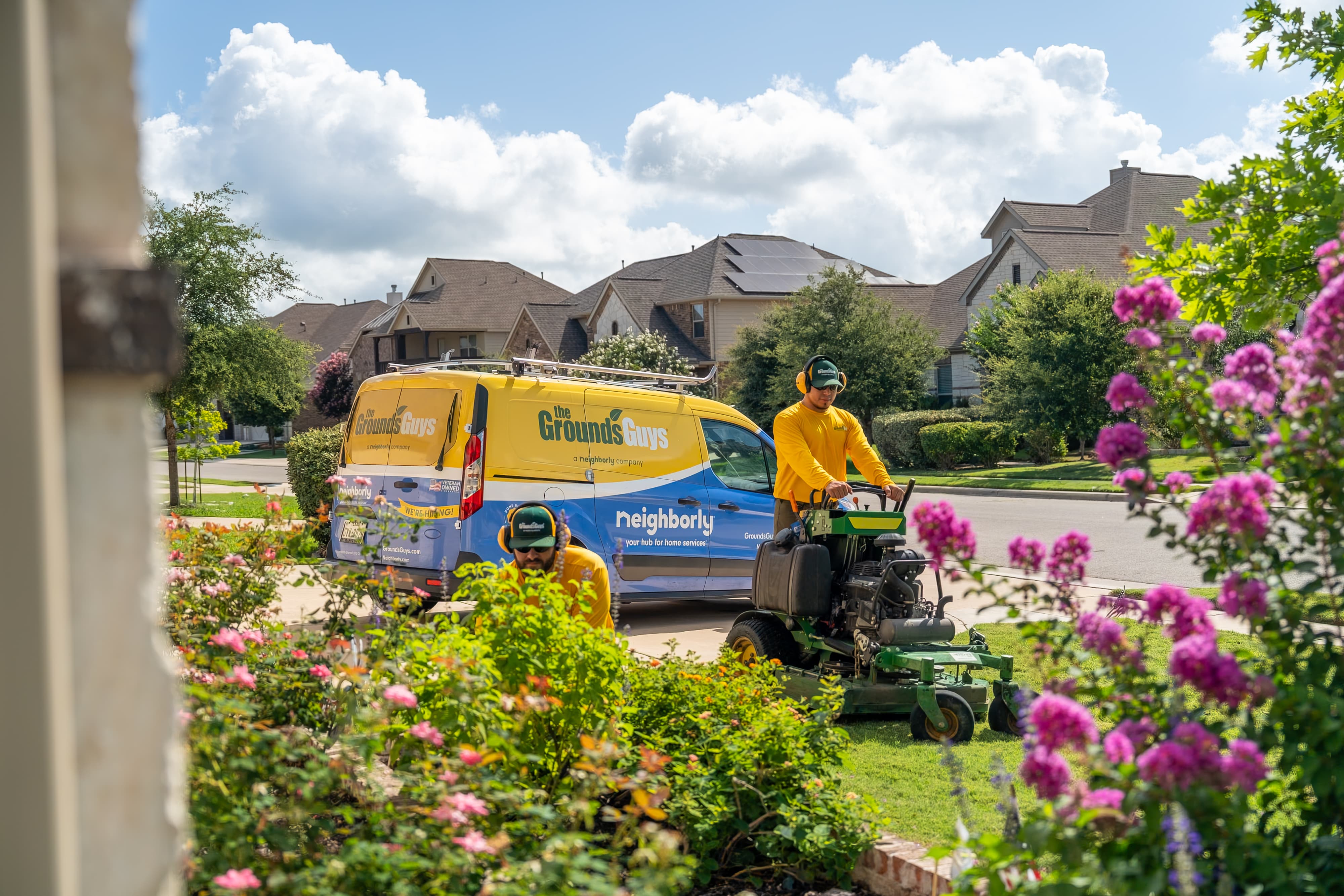 Grounds Guys maintenance crew at a customers house.