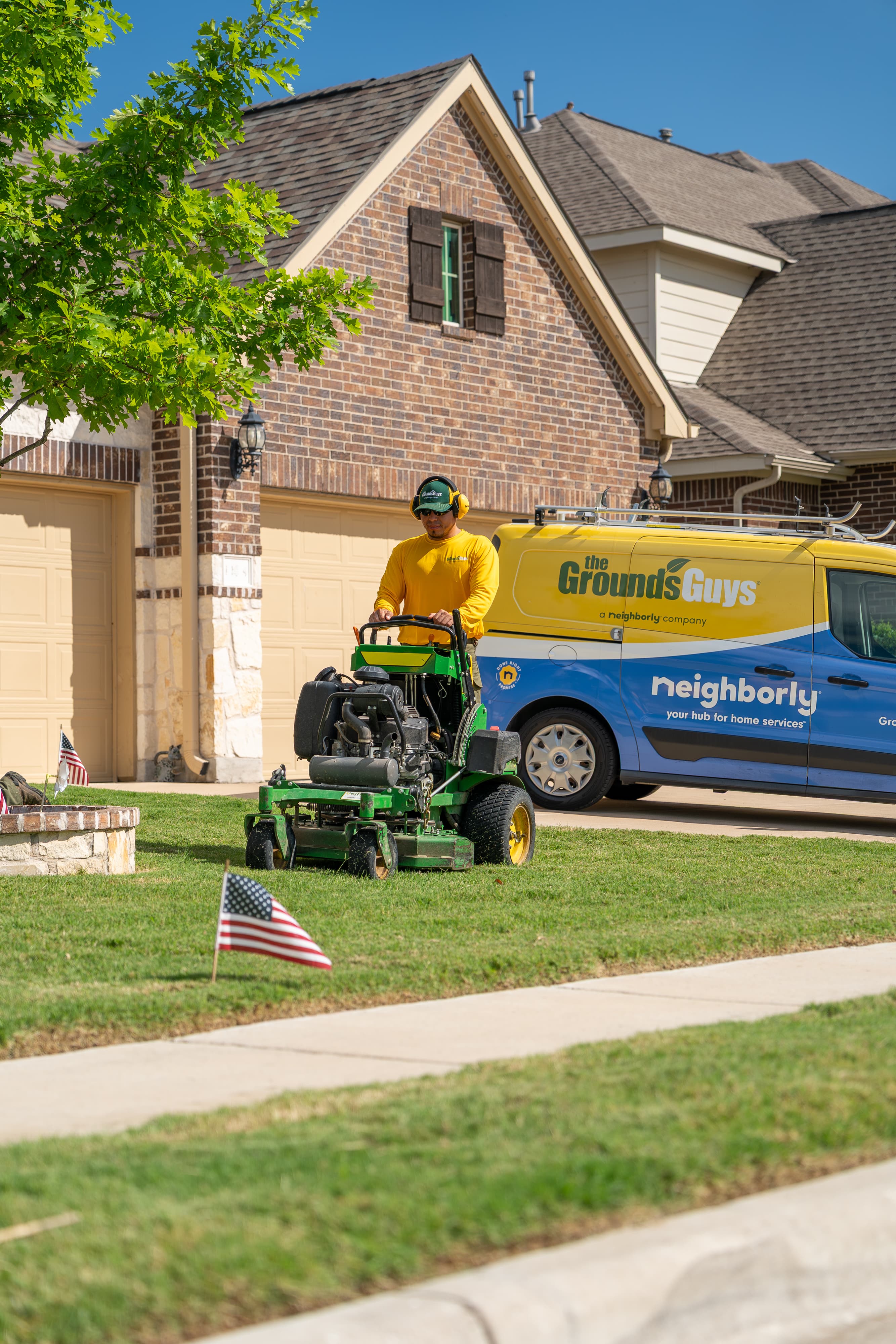 Grounds Guys maintenance crew at a customers house.