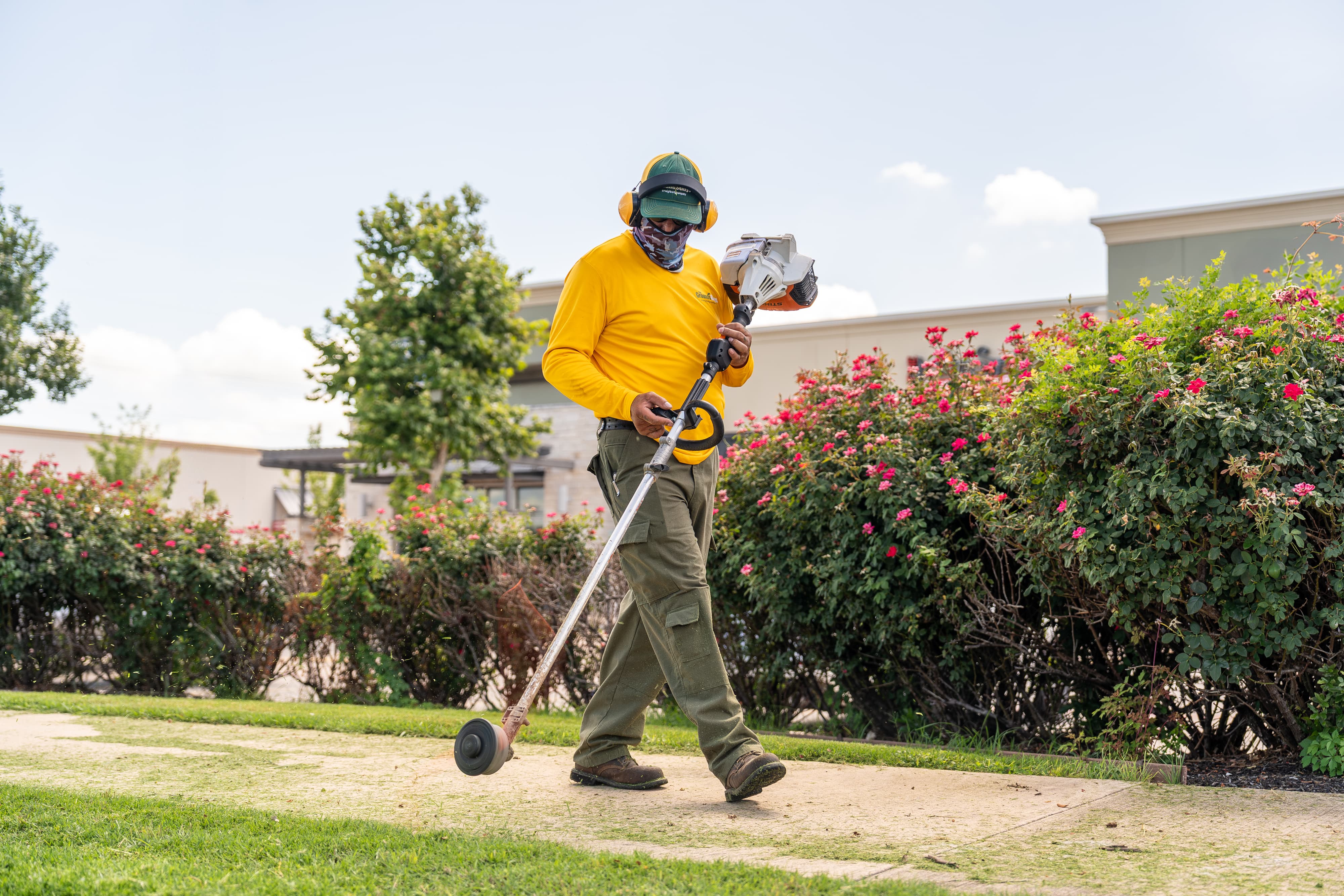 Grounds Guys maintenance crew working on a commercial landscaping project.