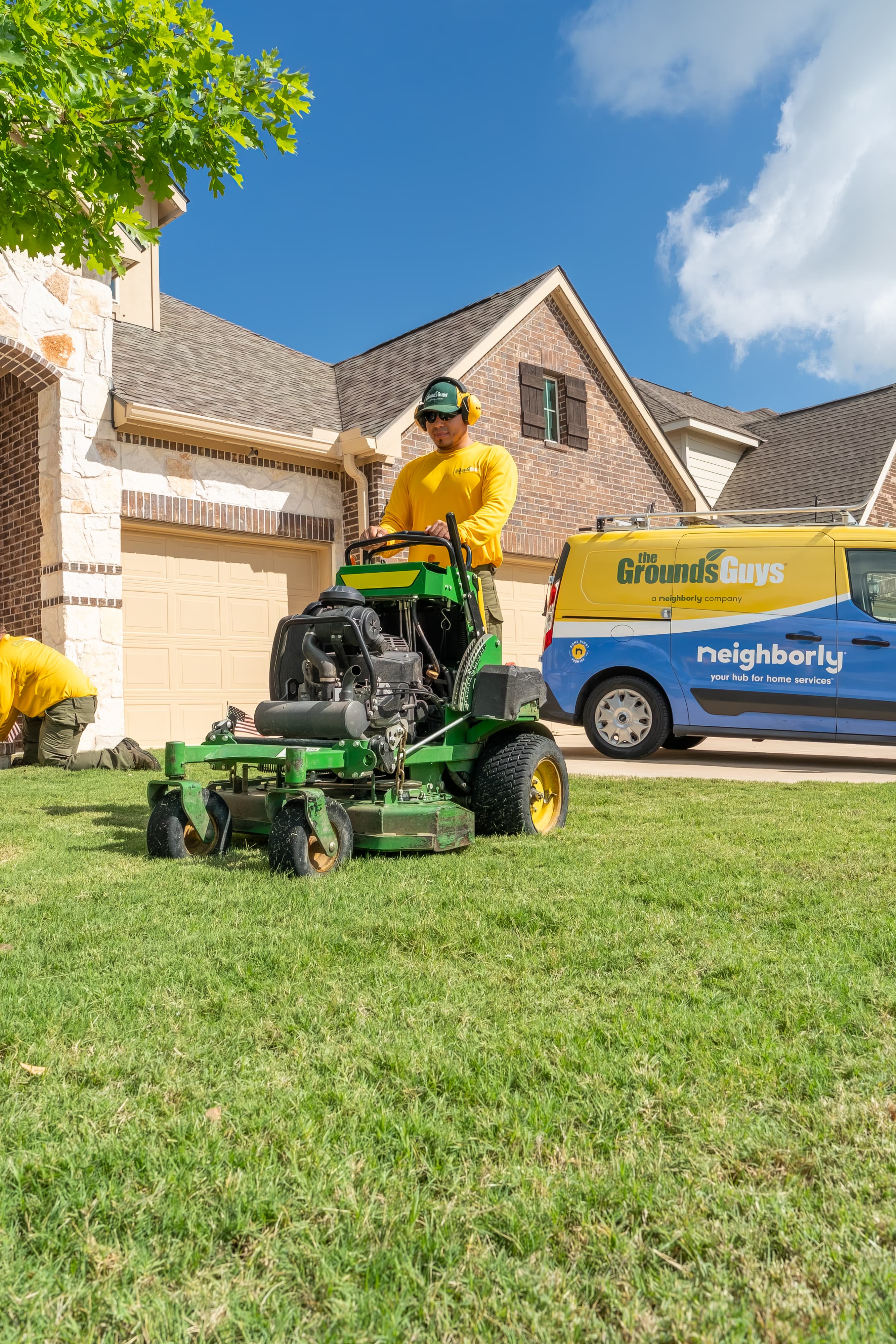Grounds Guys maintenance crew at a customers house.